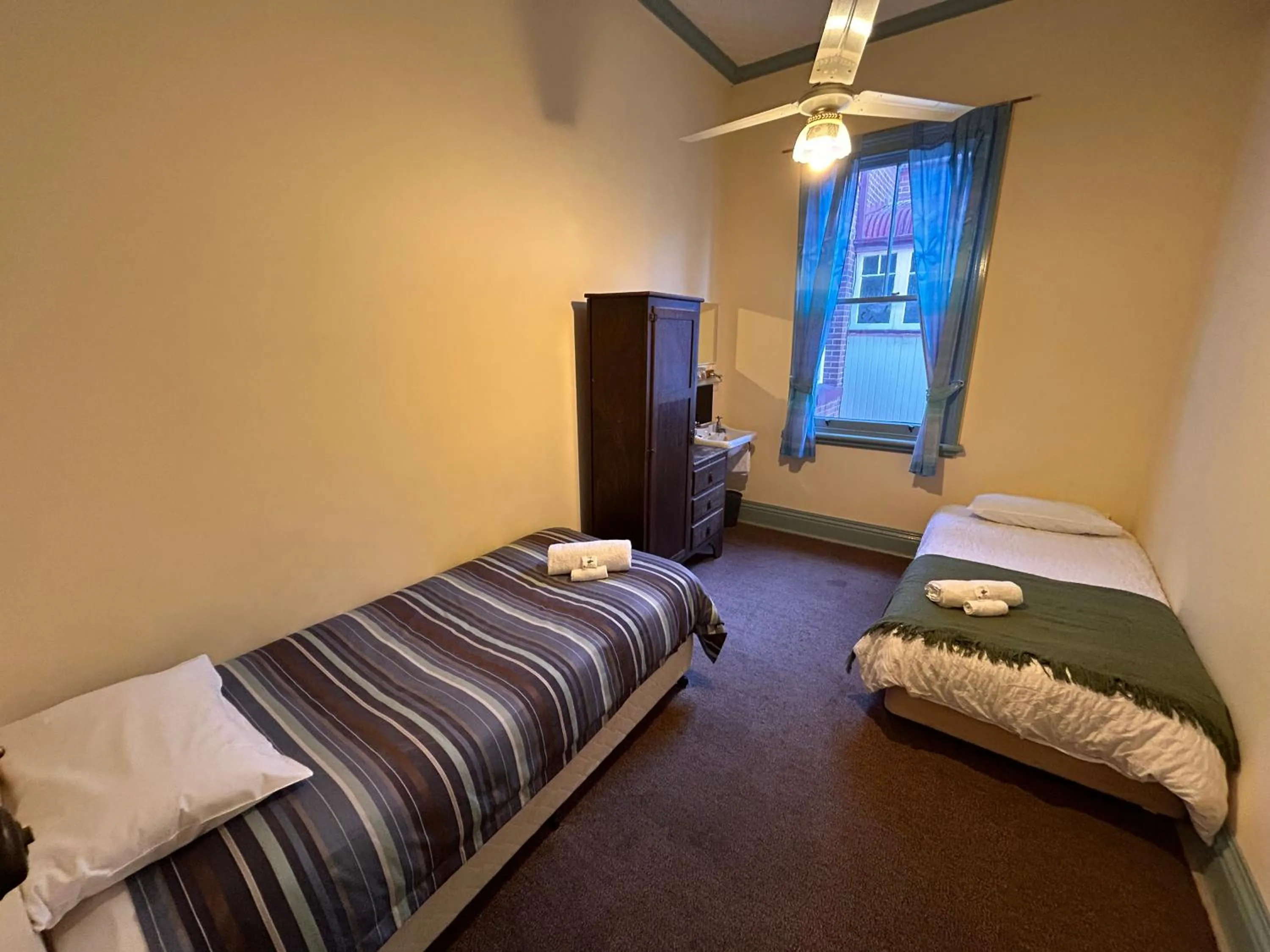 Bed in Criterion Warwick Hotel