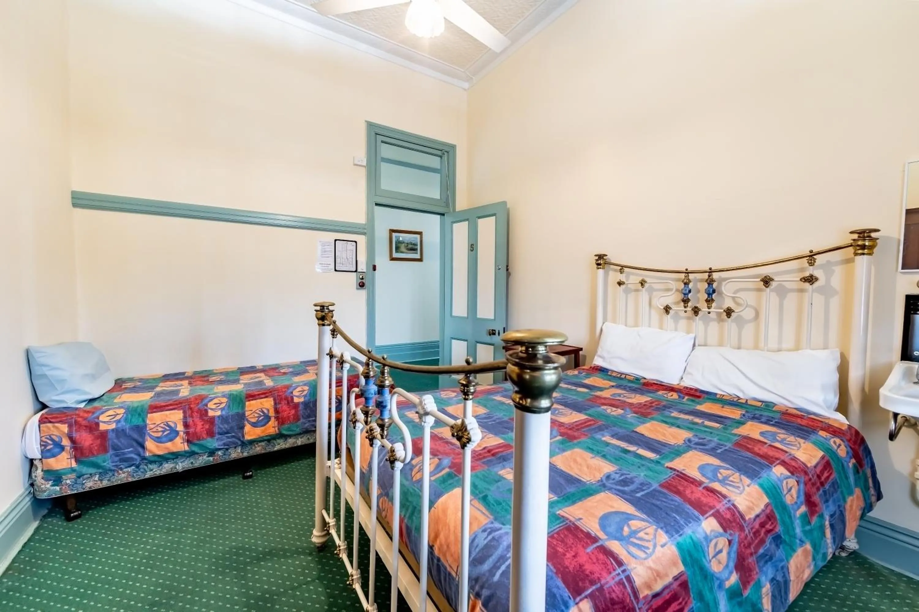 Bed in Criterion Warwick Hotel