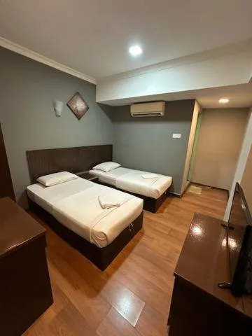 Bed in Li Garden Hotel