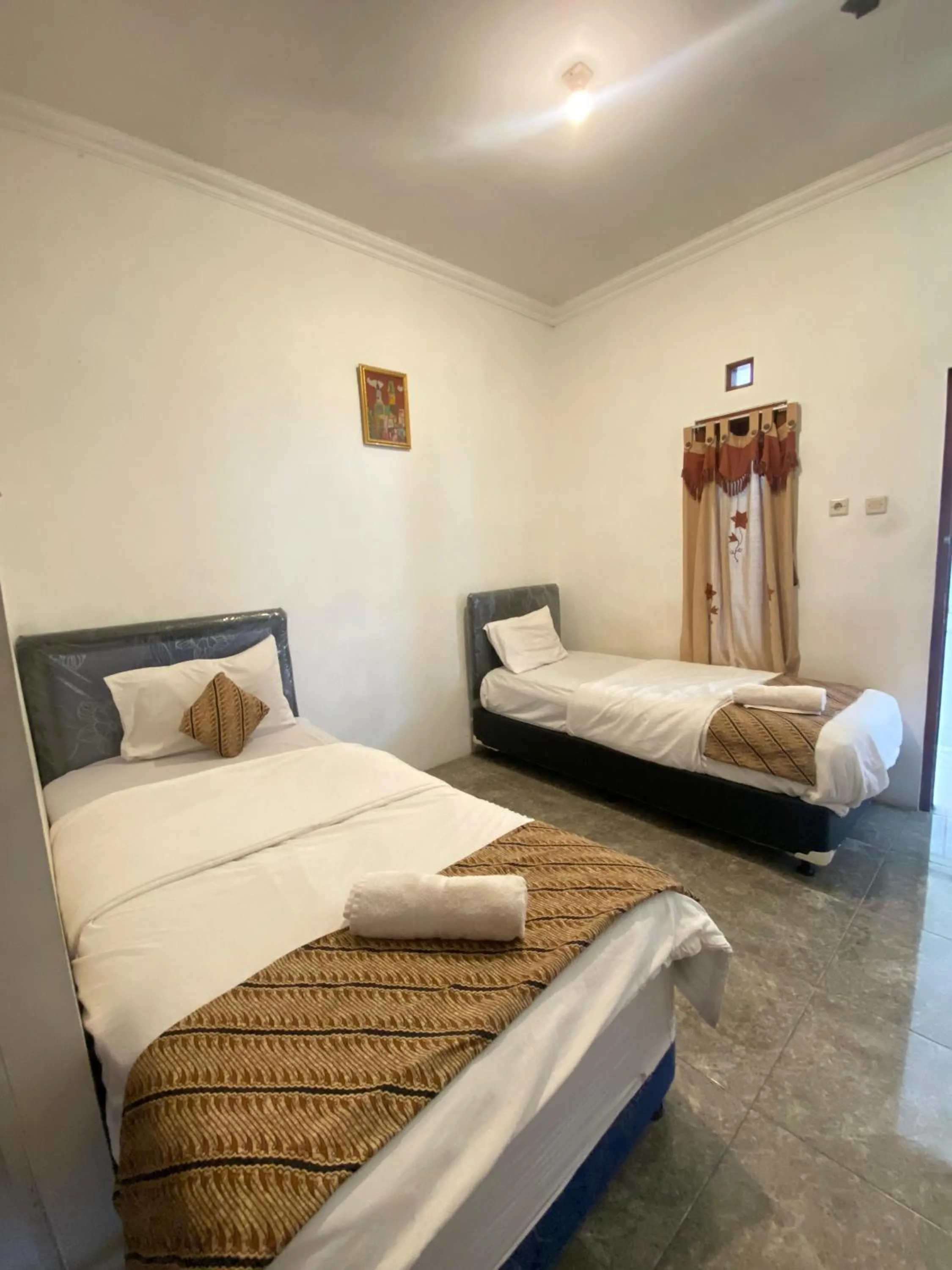 Twin Room with Balcony in Sastro Inn Syariah Hotel Malioboro