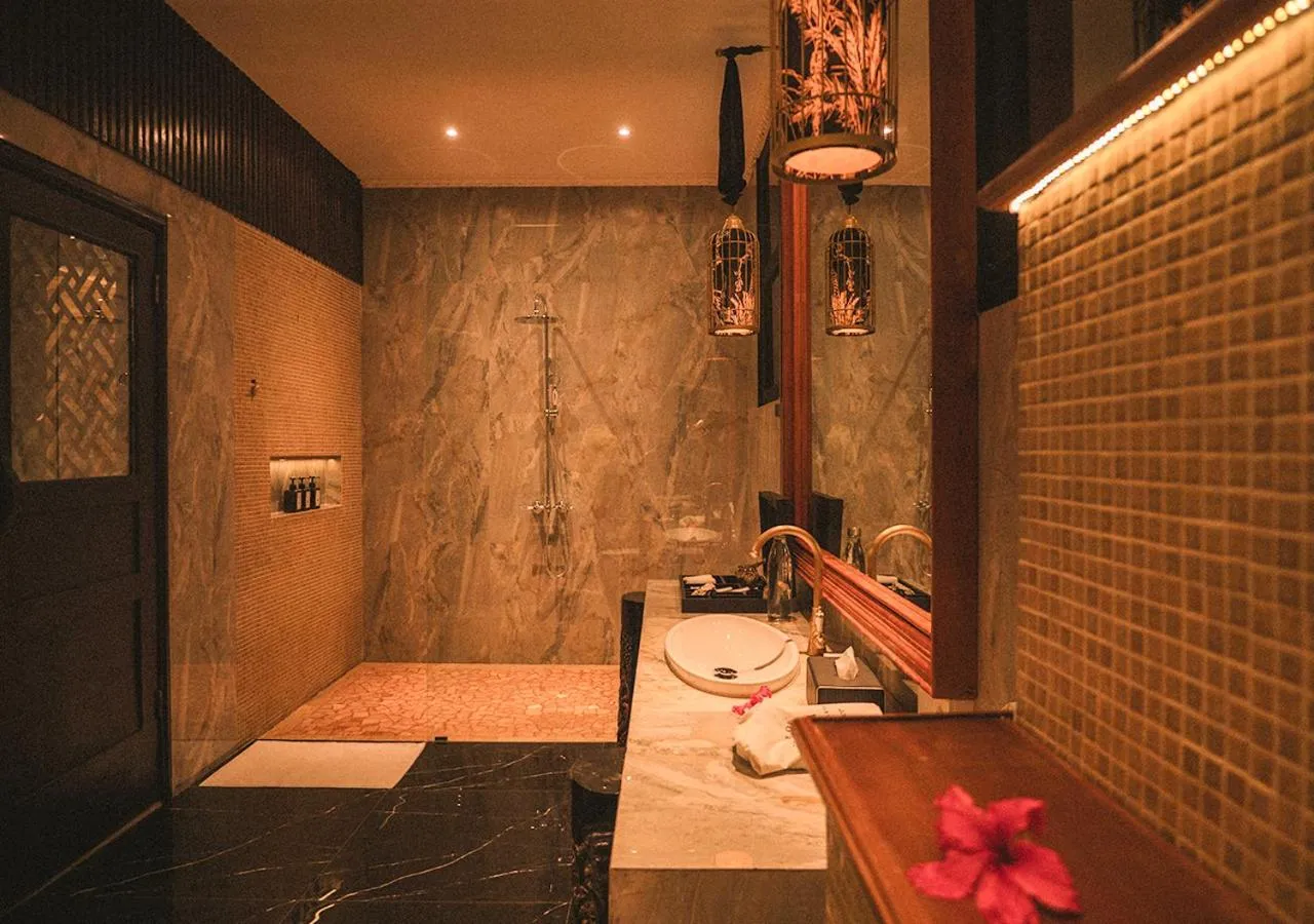 Bathroom in House of Tugu, Old Town Jakarta