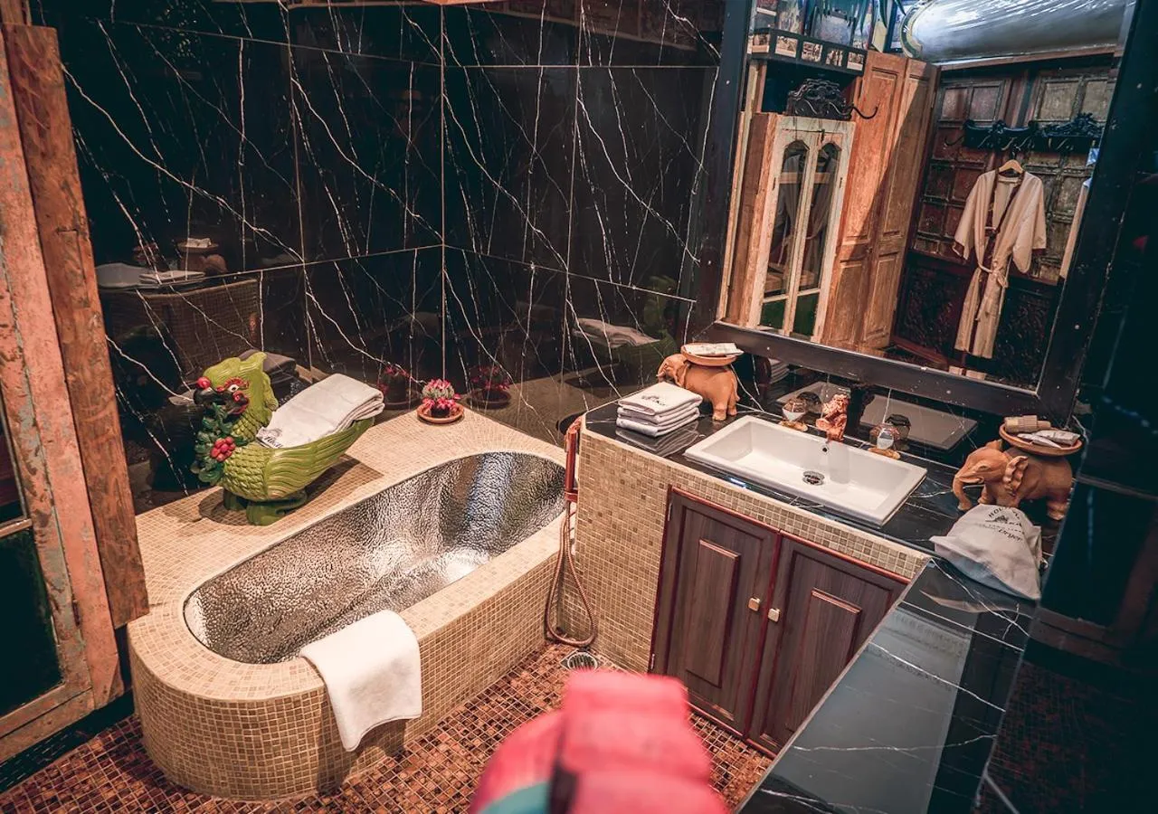 Bathroom in House of Tugu, Old Town Jakarta