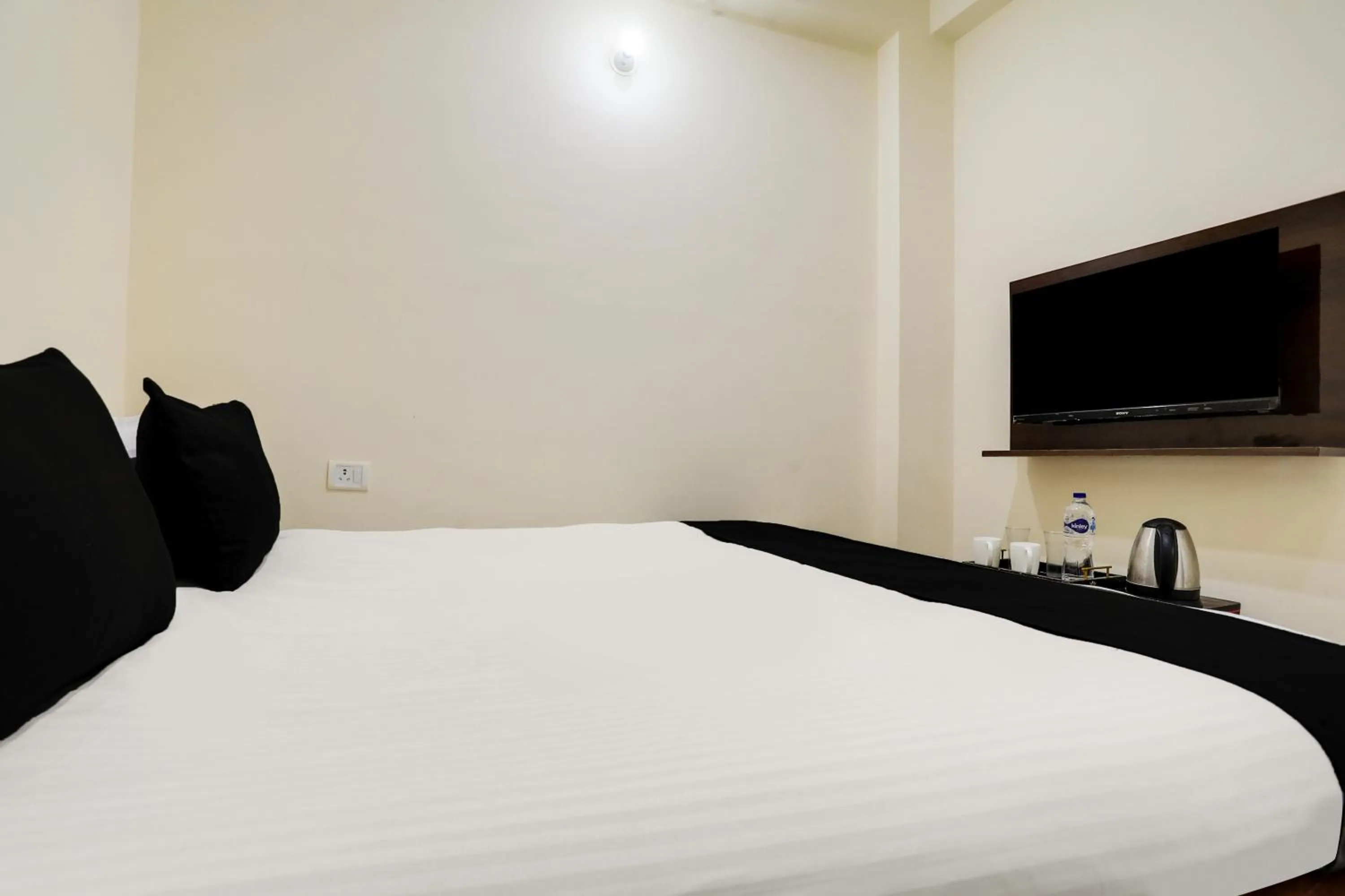 Bedroom in Hotel O M.V PALACE