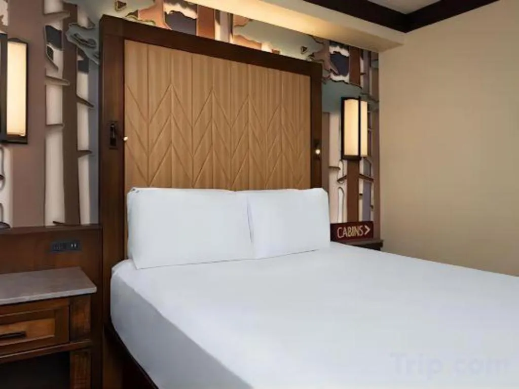 Bed in Disney's Wilderness Lodge