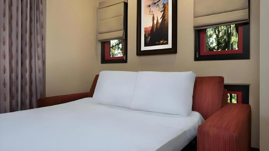 Bed in Disney's Wilderness Lodge