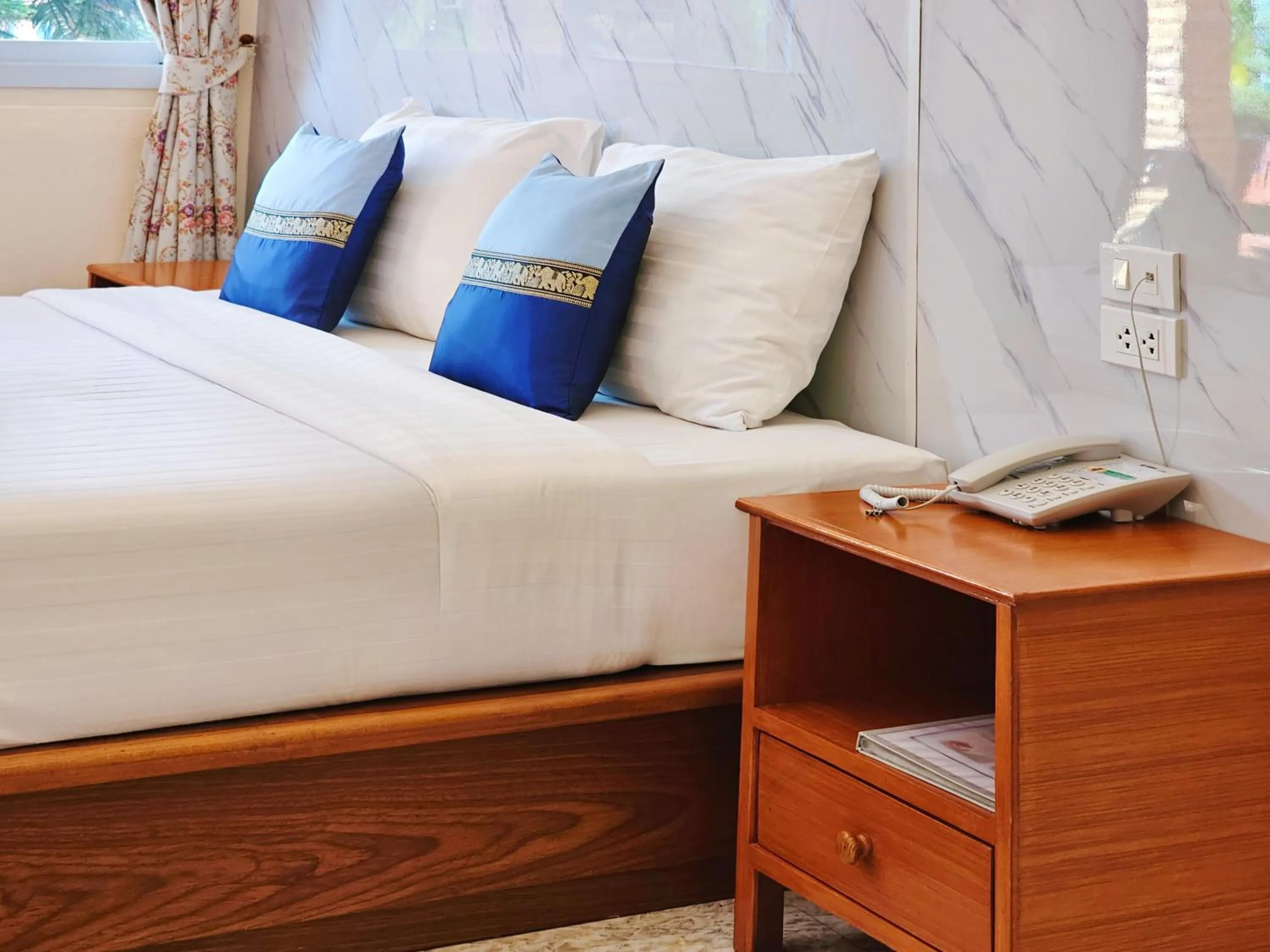Bed in Phaithong Sotel Resort