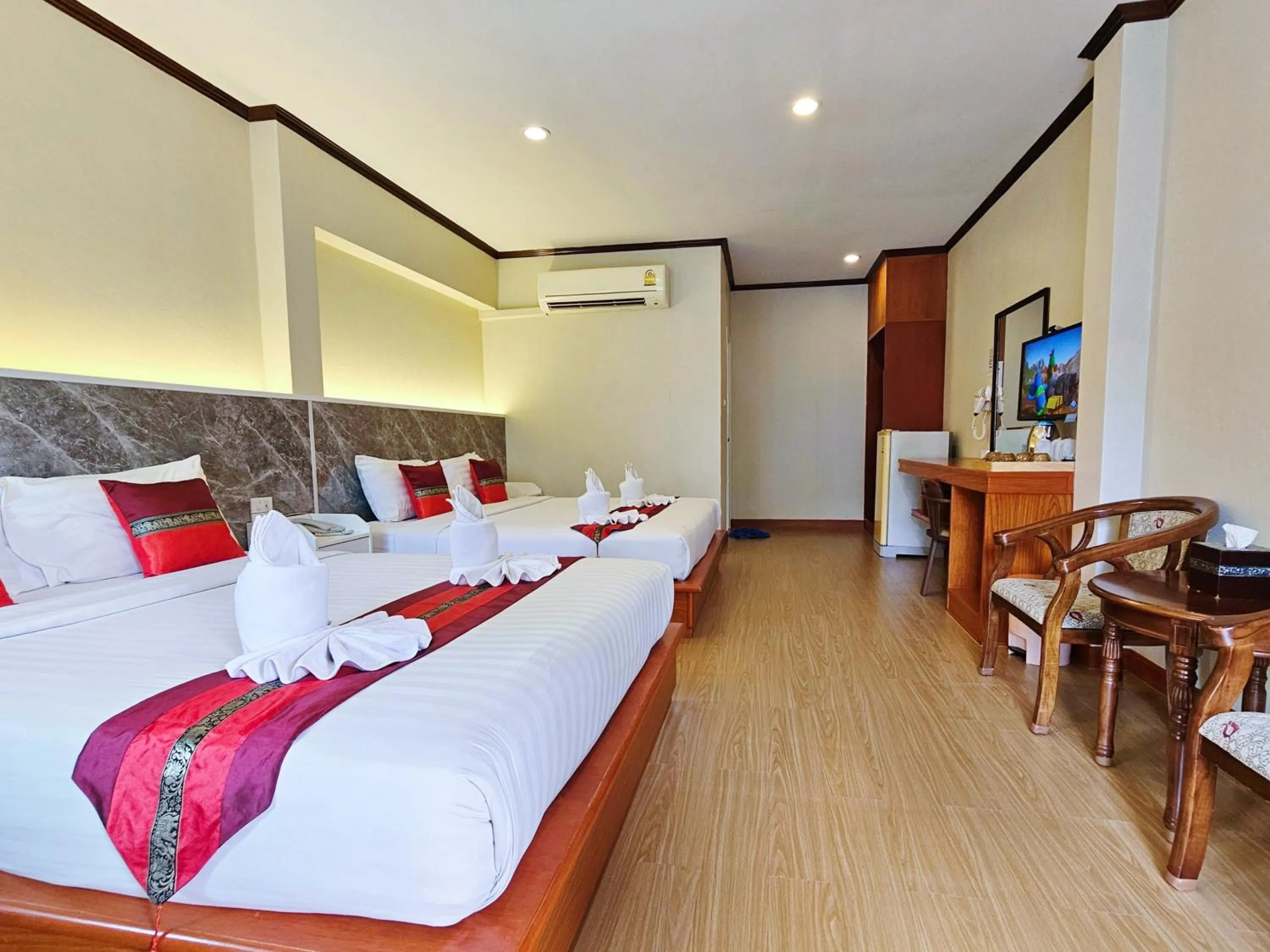 Bed in Phaithong Sotel Resort