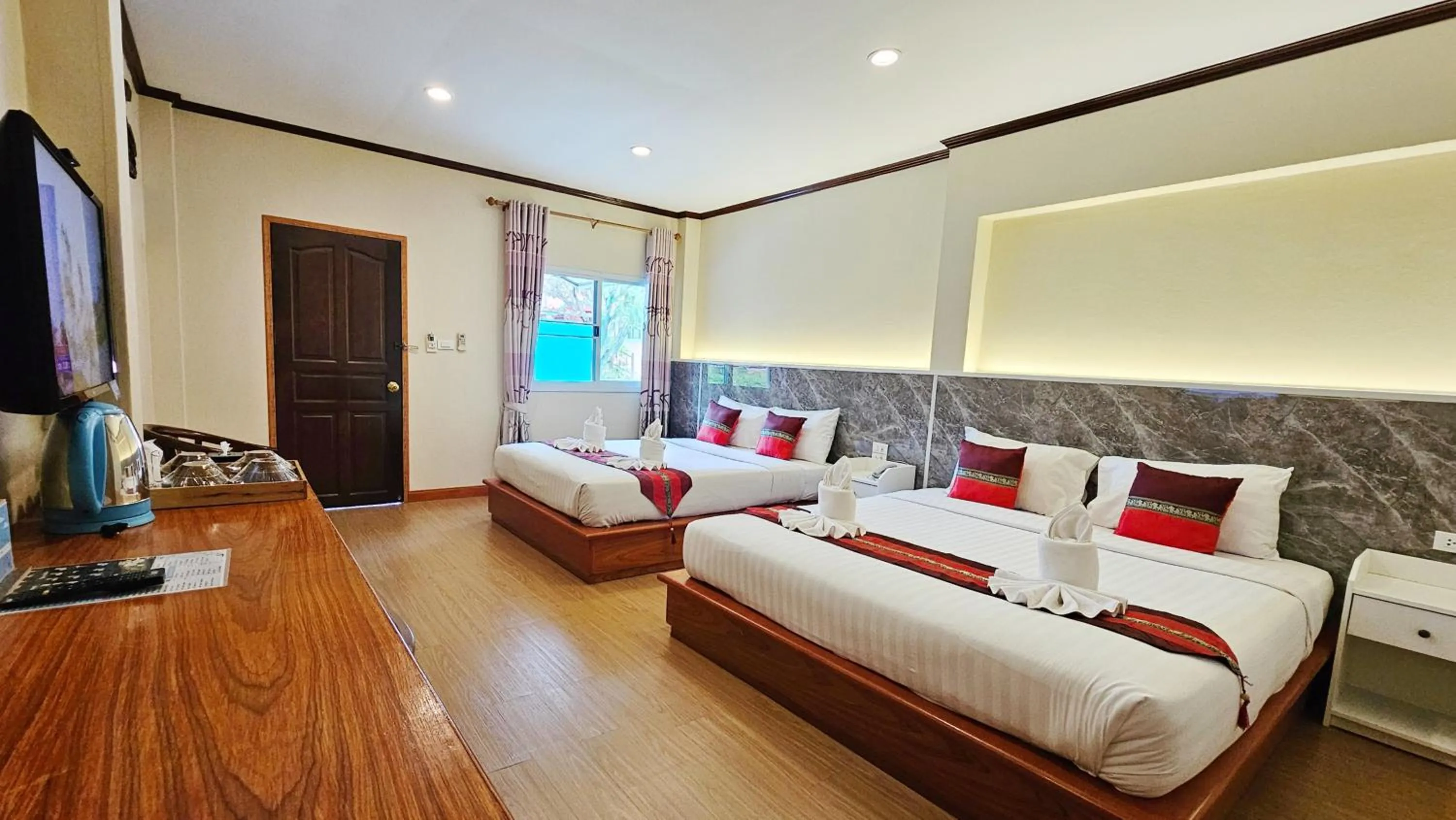 Bed in Phaithong Sotel Resort