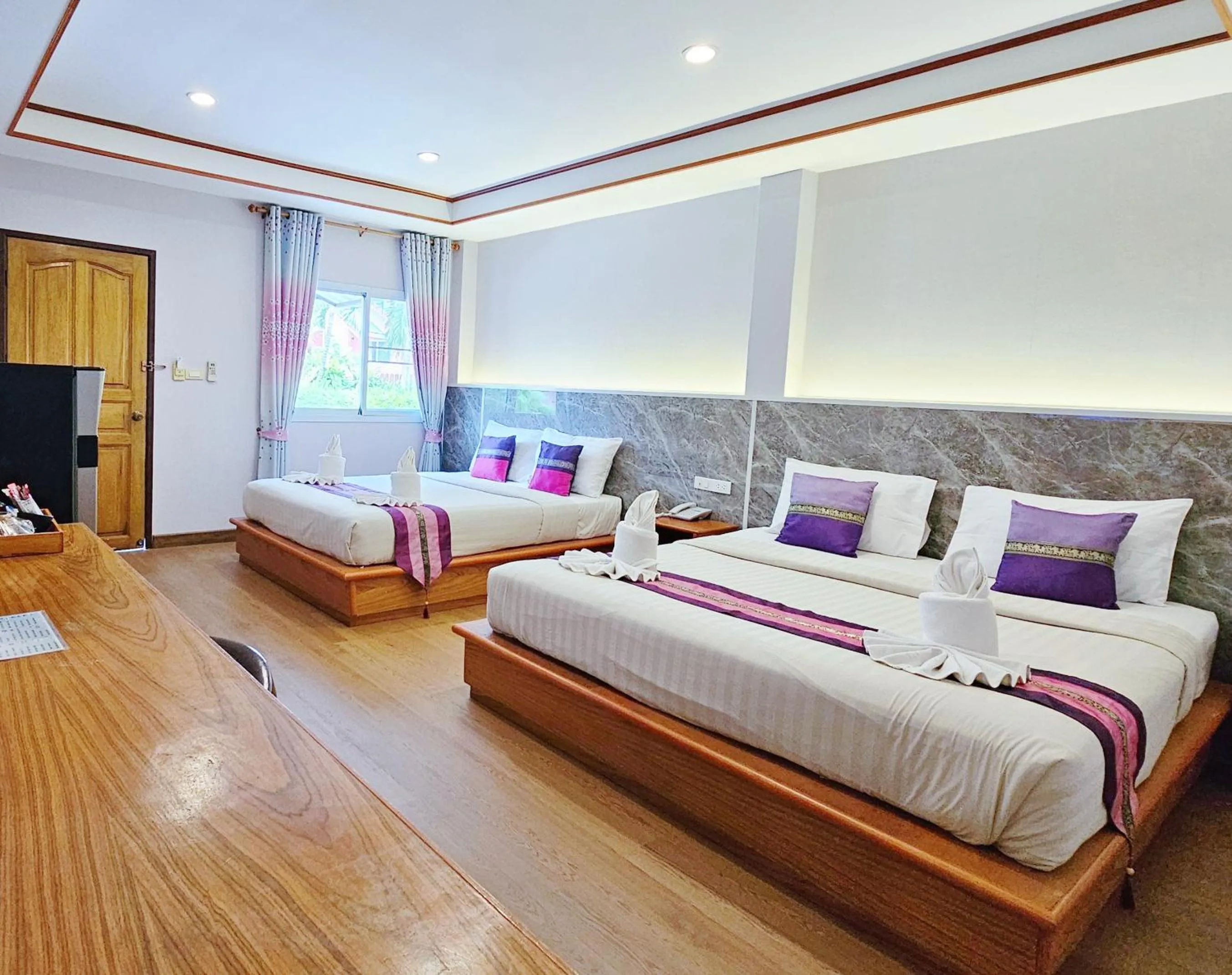Bed in Phaithong Sotel Resort