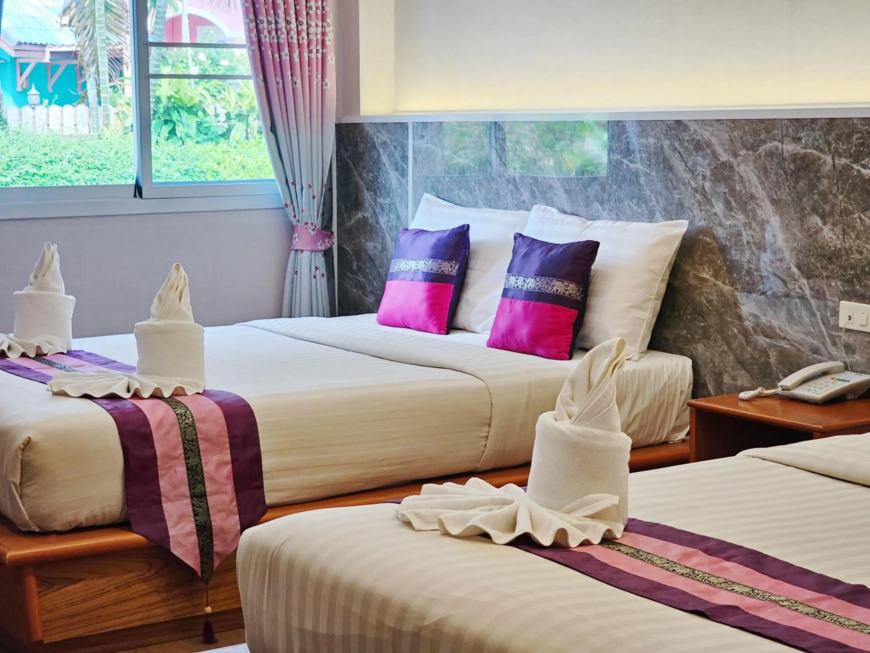 Bed in Phaithong Sotel Resort