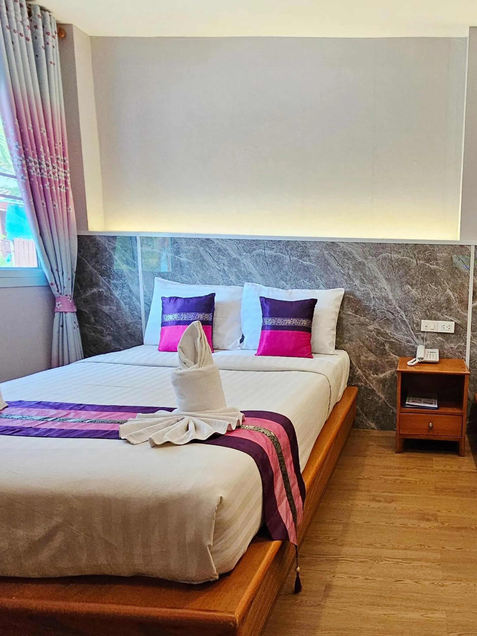 Bed in Phaithong Sotel Resort