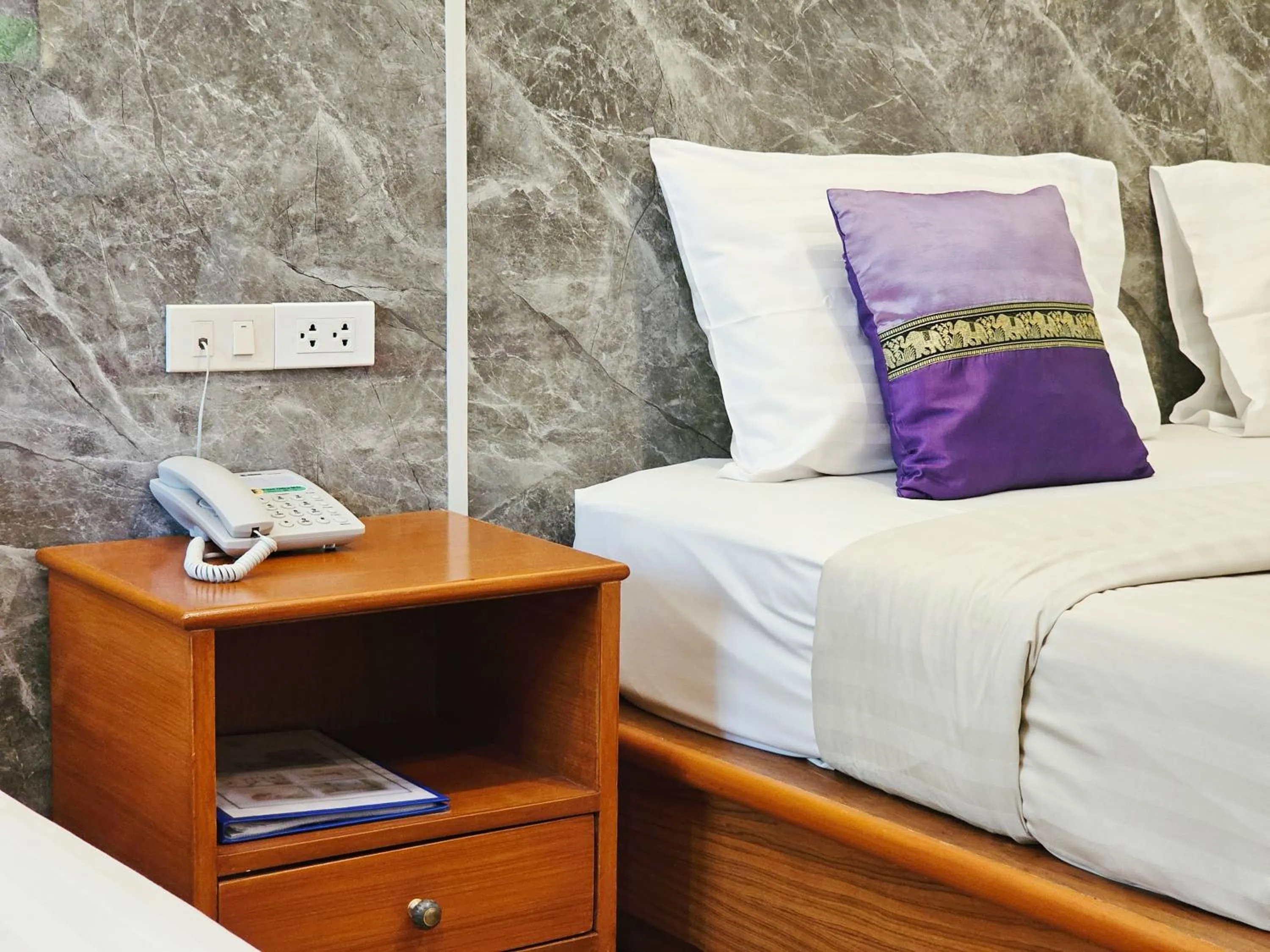 Bed in Phaithong Sotel Resort