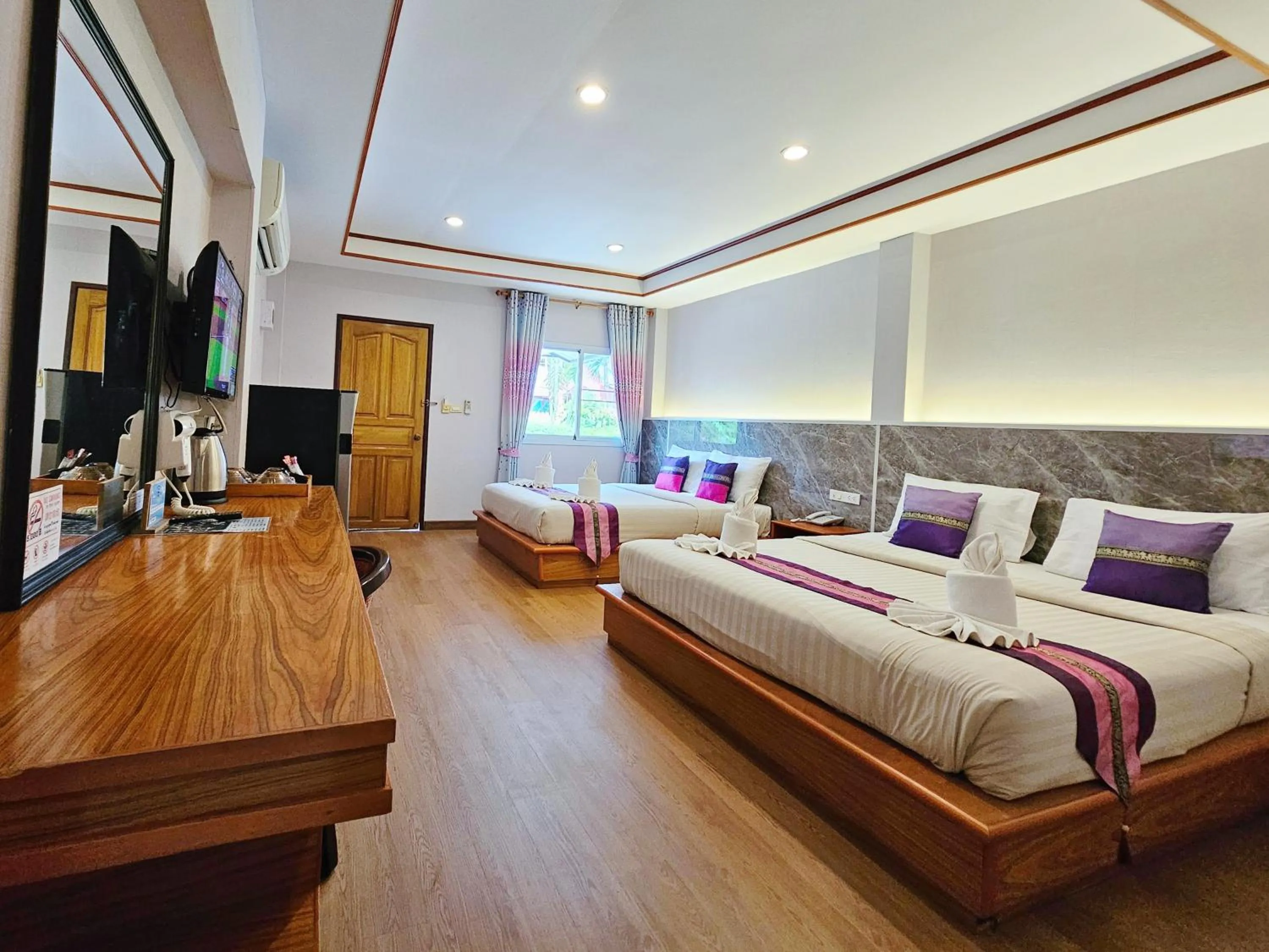 Photo of the whole room, Bed in Phaithong Sotel Resort