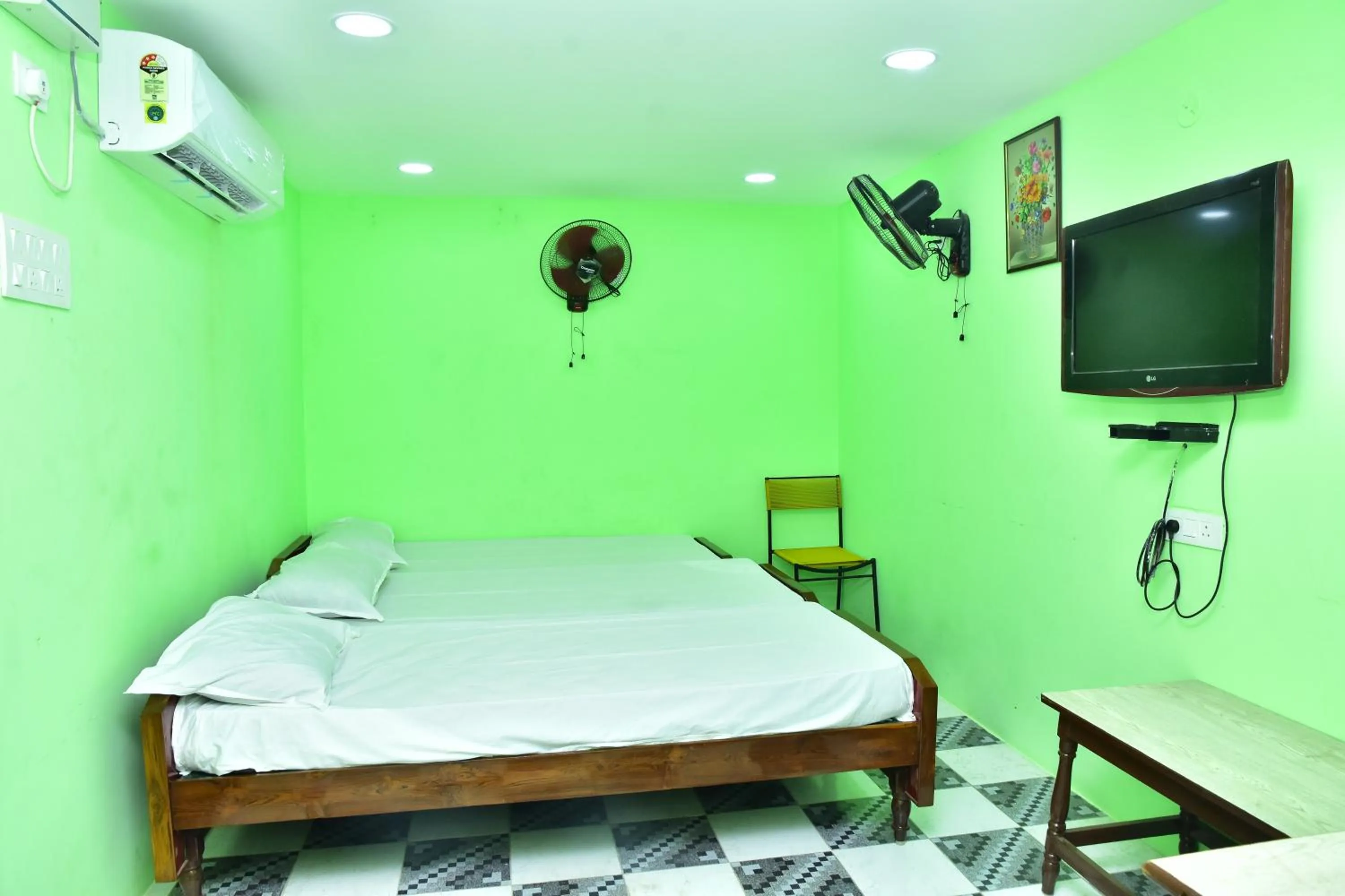 Bedroom in Sri Tirumalaa Hotel