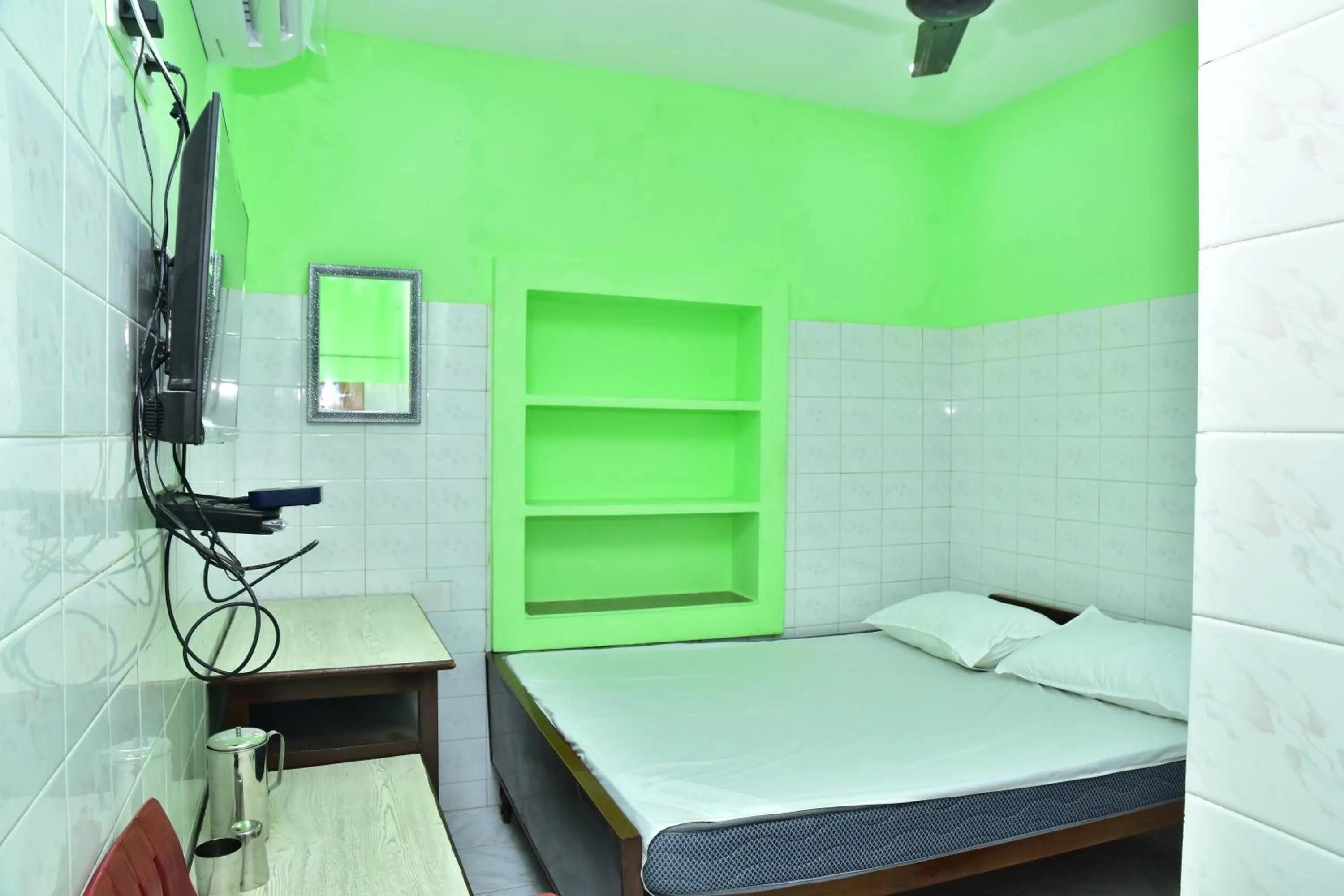 Bedroom in Sri Tirumalaa Hotel