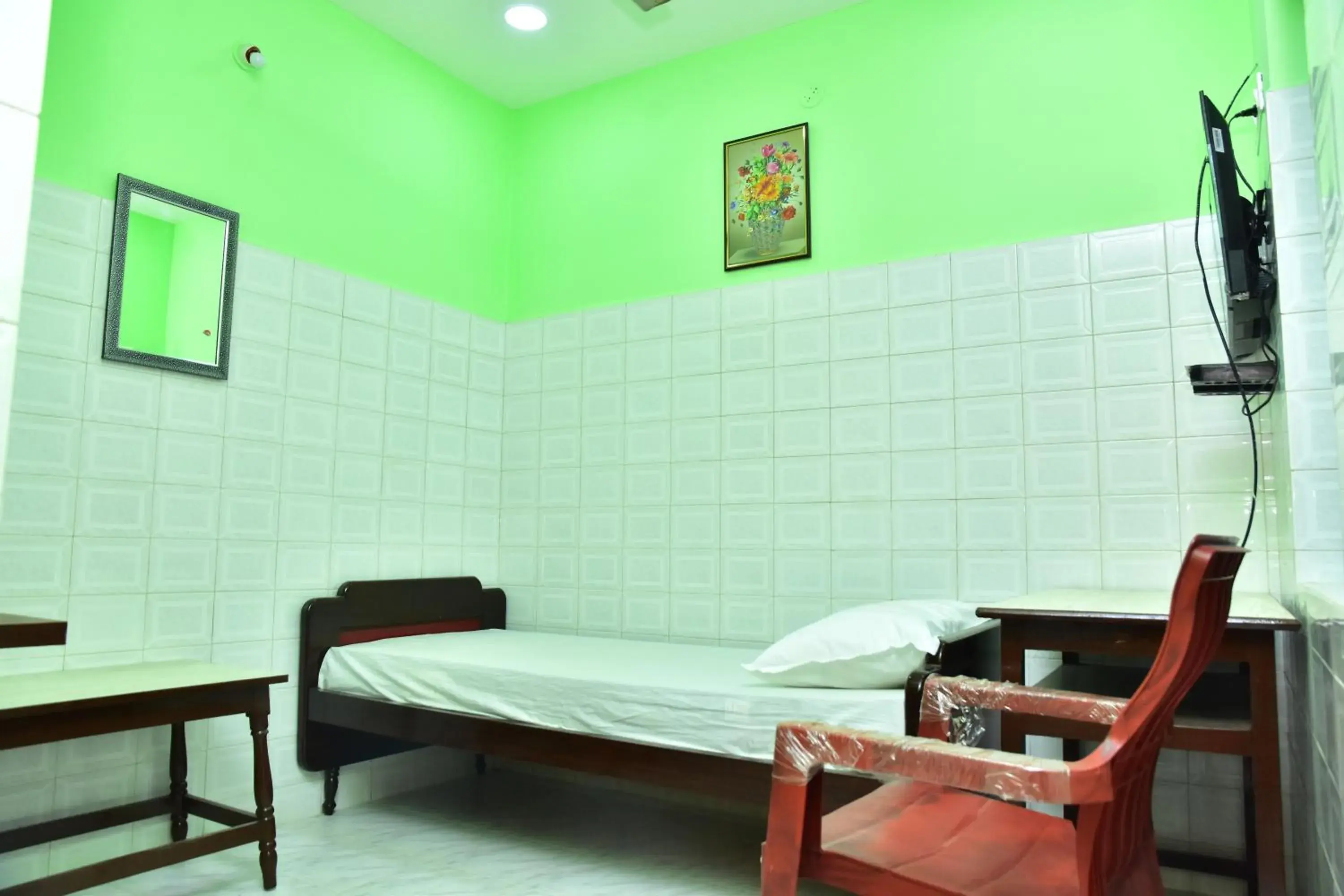 Bed in Sri Tirumalaa Hotel Bed in Sri Tirumalaa Hotel