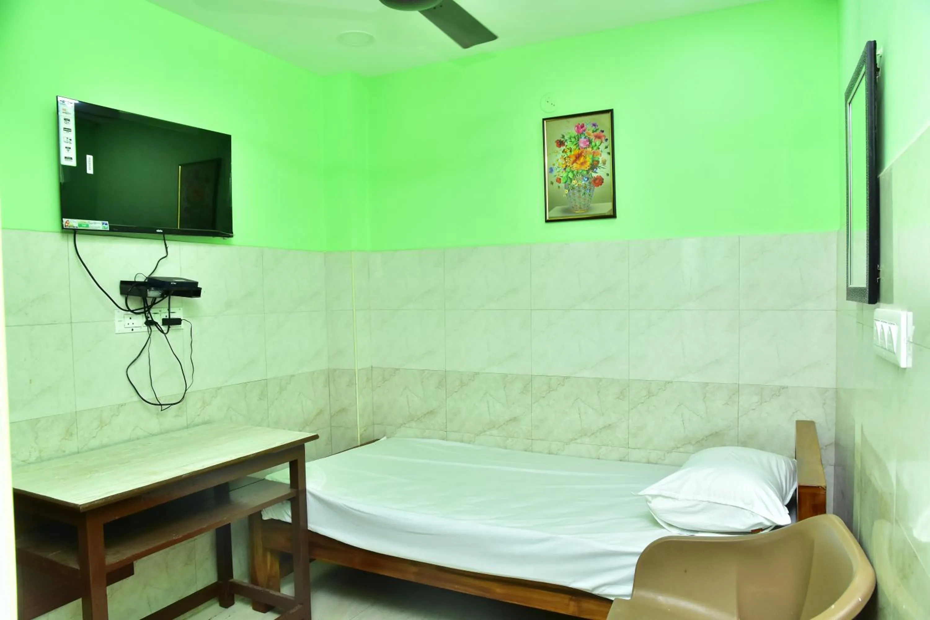 Bedroom in Sri Tirumalaa Hotel