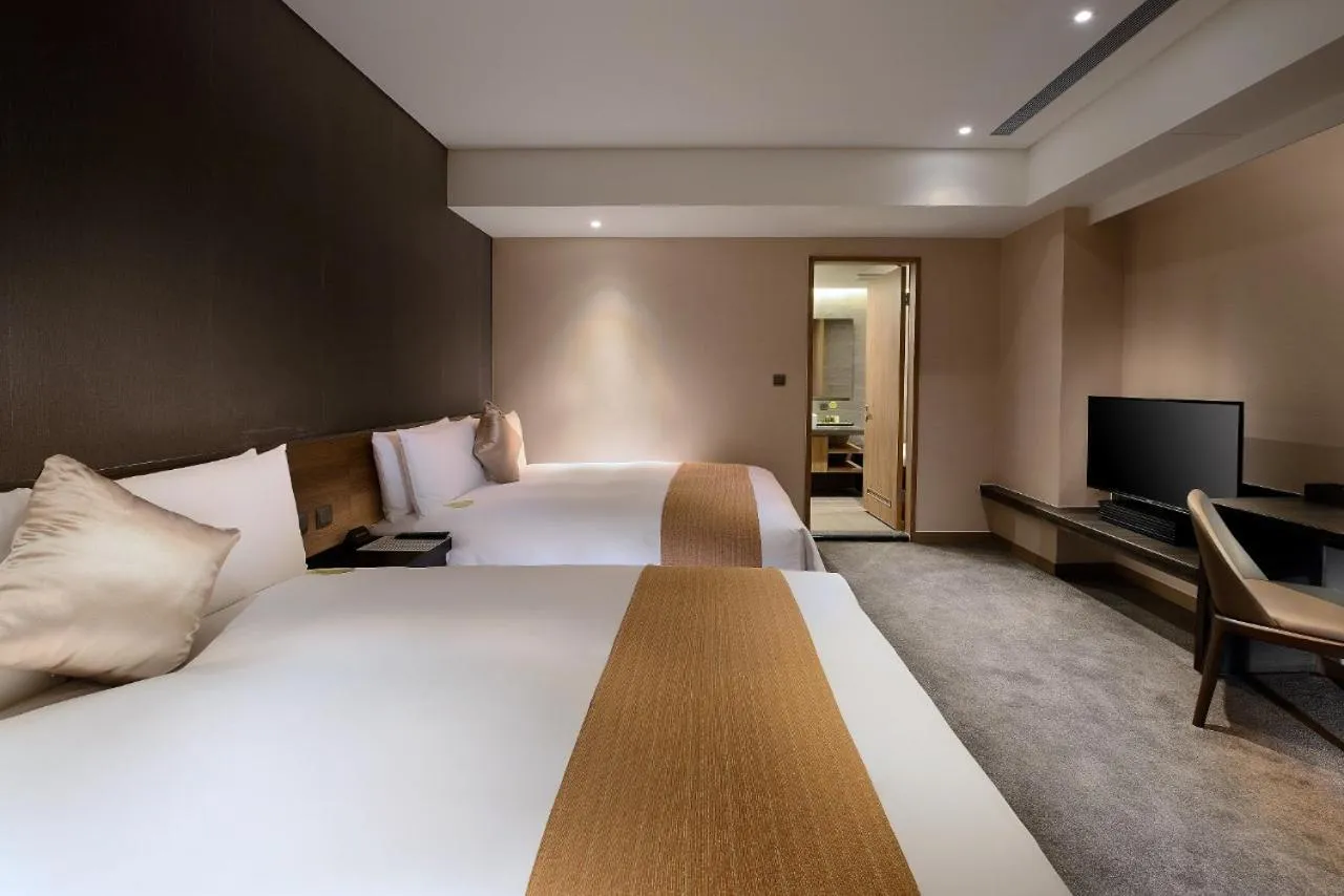 Bed in Hualien Holiday Hotel