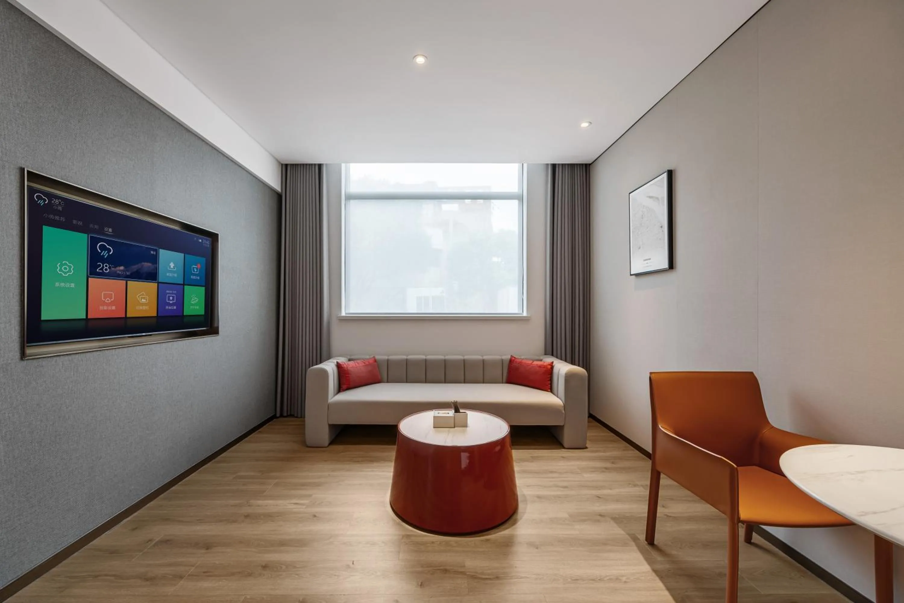 Seating area in Ramadaencore By Wyndham Shanghai Pud ong Airport -Provide free 24hour shuttle bus service for airport pick-up and drop-off at Pud ong Airport