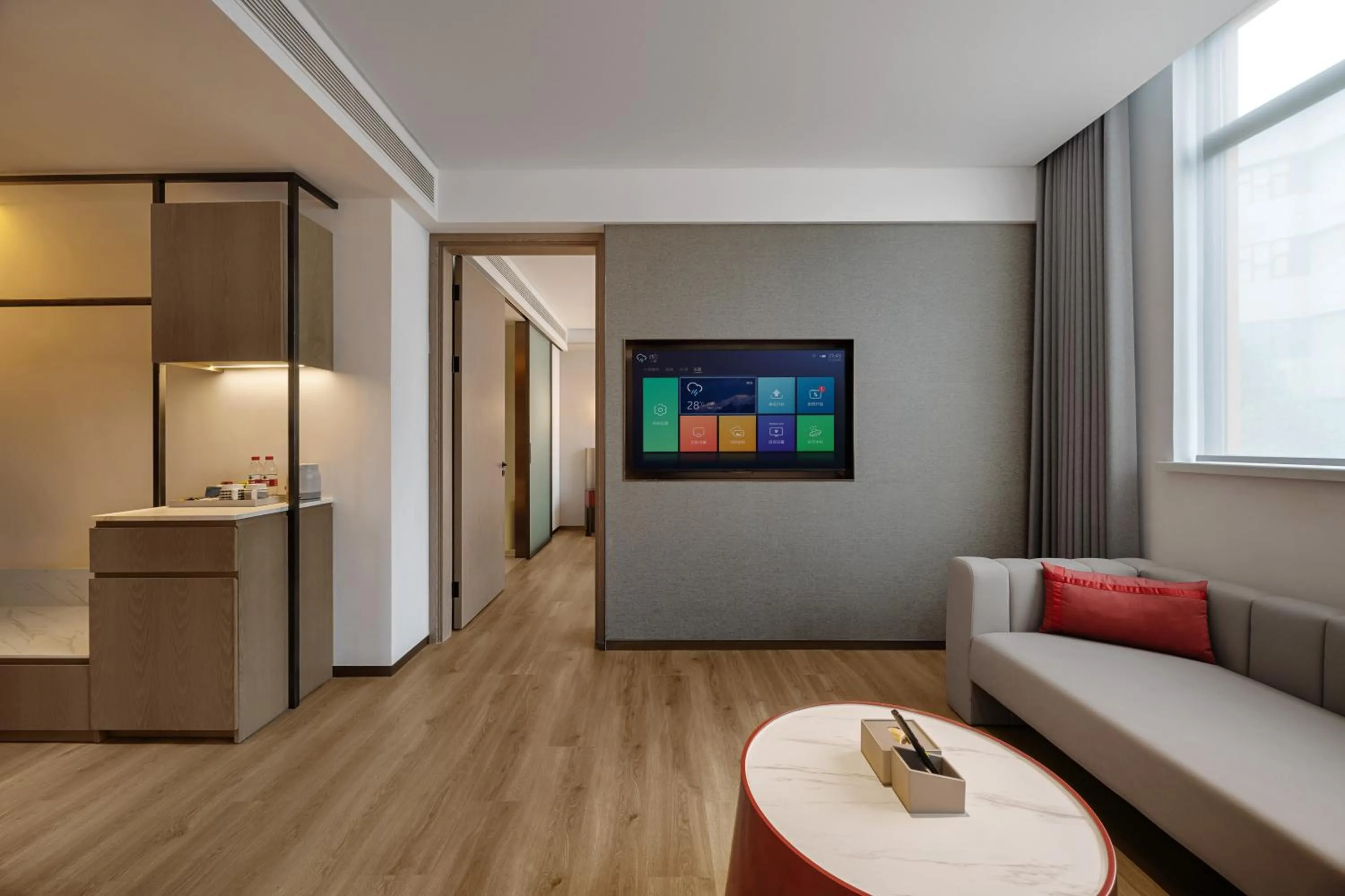 Photo of the whole room in Ramadaencore By Wyndham Shanghai Pud ong Airport -Provide free 24hour shuttle bus service for airport pick-up and drop-off at Pud ong Airport