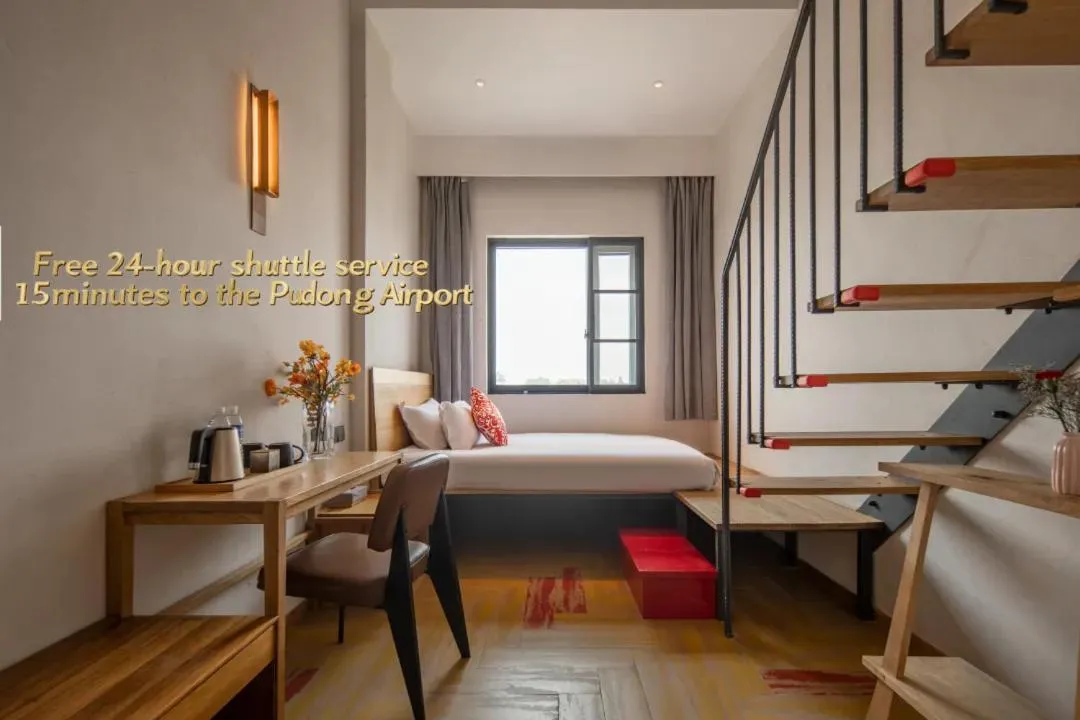 Photo of the whole room, Bed in Ramadaencore By Wyndham Shanghai Pud ong Airport -Provide free 24hour shuttle bus service for airport pick-up and drop-off at Pud ong Airport