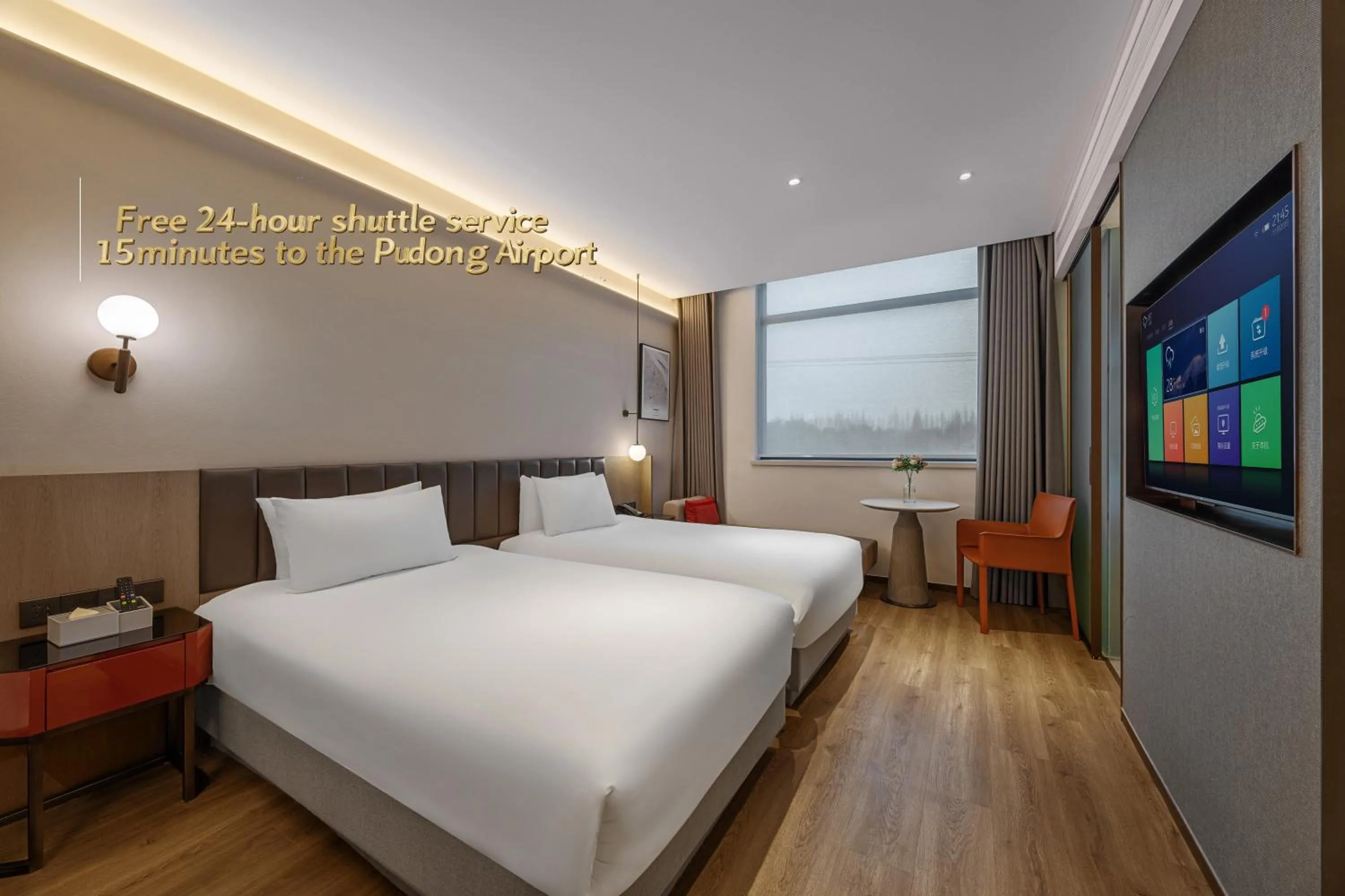 Photo of the whole room, Bed in Ramadaencore By Wyndham Shanghai Pud ong Airport -Provide free 24hour shuttle bus service for airport pick-up and drop-off at Pud ong Airport