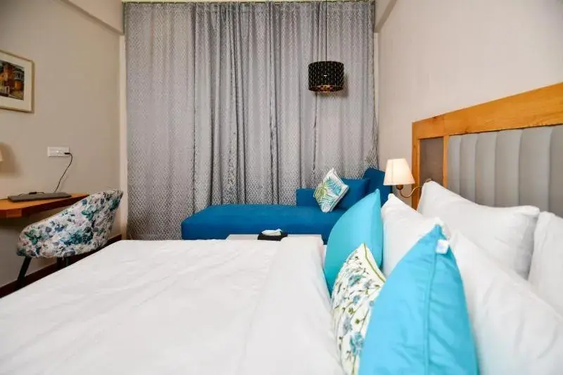 Photo of the whole room, Bed in Hotel Aviral Ganga Photo of the whole room, Bed in Hotel Aviral Ganga