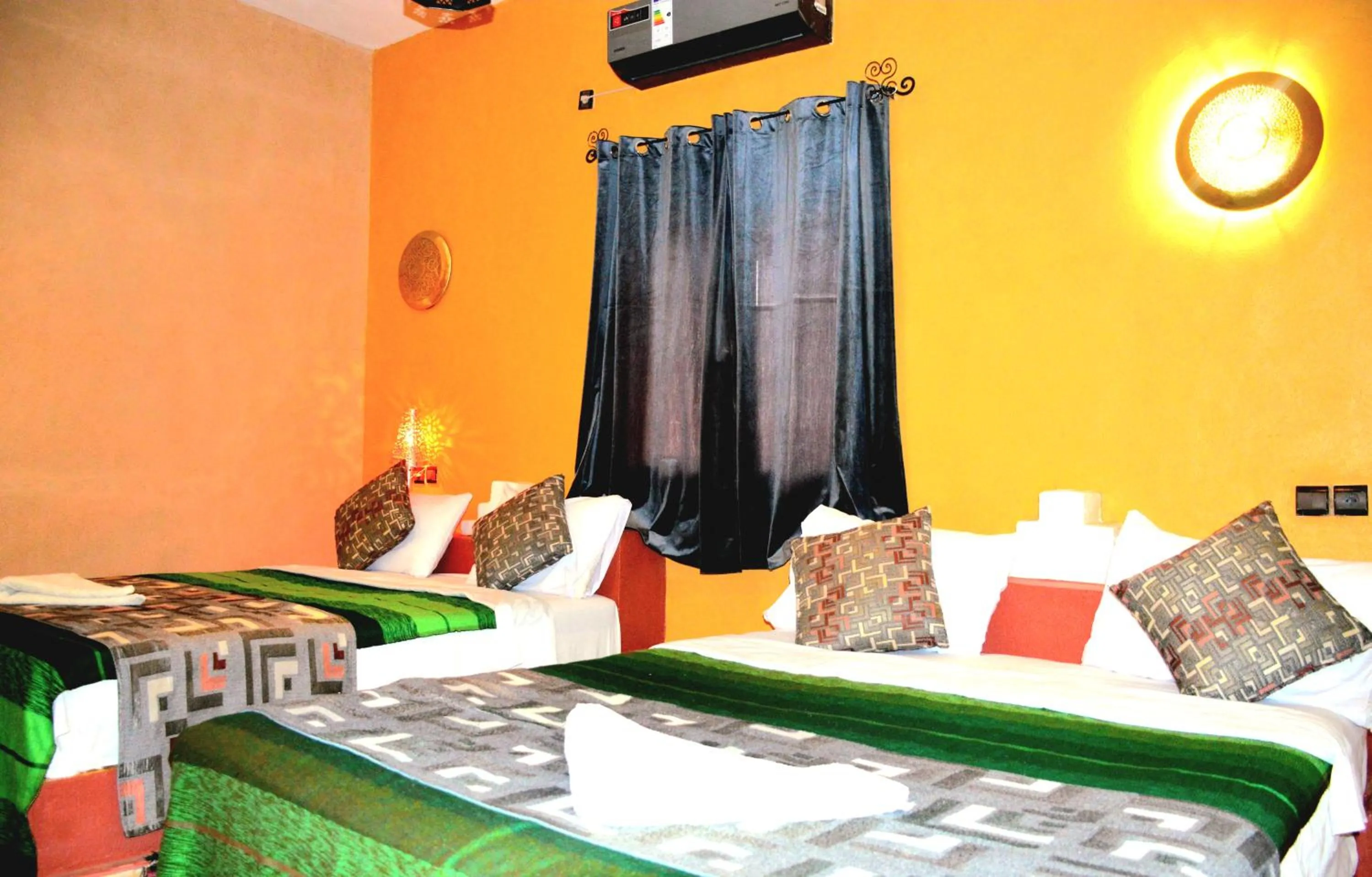 Bed in Kasbah Du Berger & Piscine