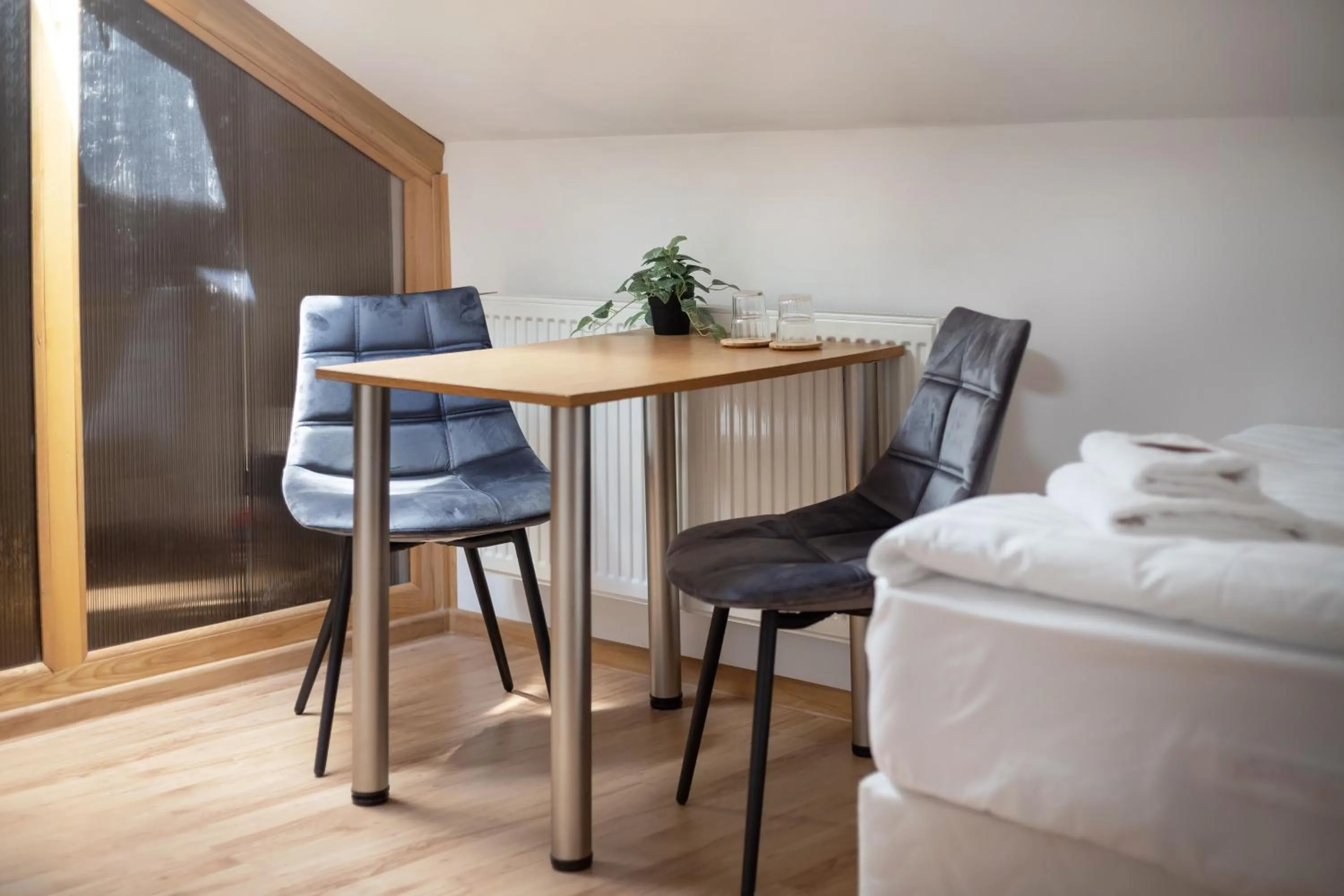 Seating area, Bed in Avanti apgyvendinimas-restoranas