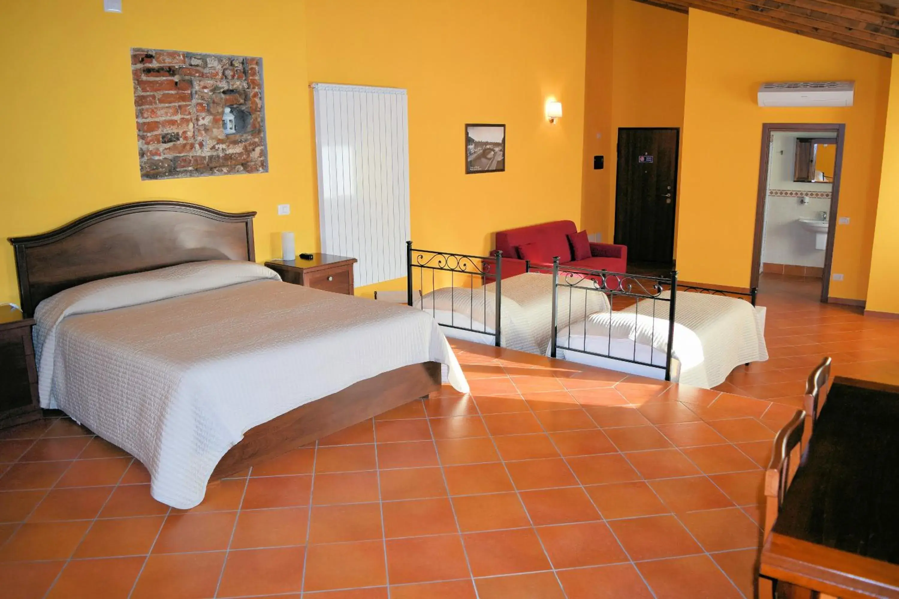 Quadruple Room in Corte Certosina Quadruple Room in Corte Certosina