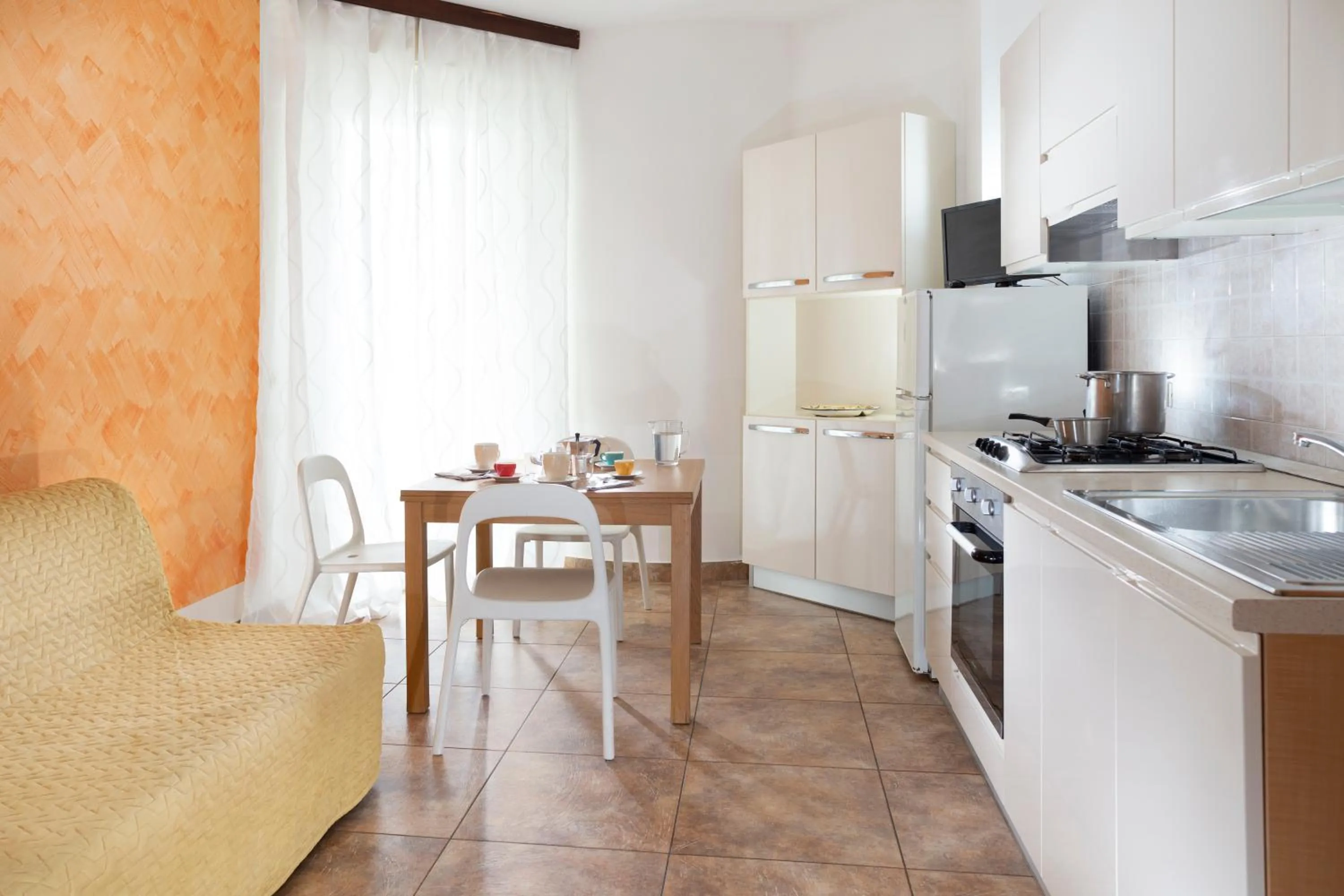 Kitchen or kitchenette in SoleMare Hotel e Residence