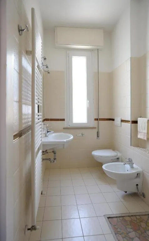 Toilet in SoleMare Hotel e Residence