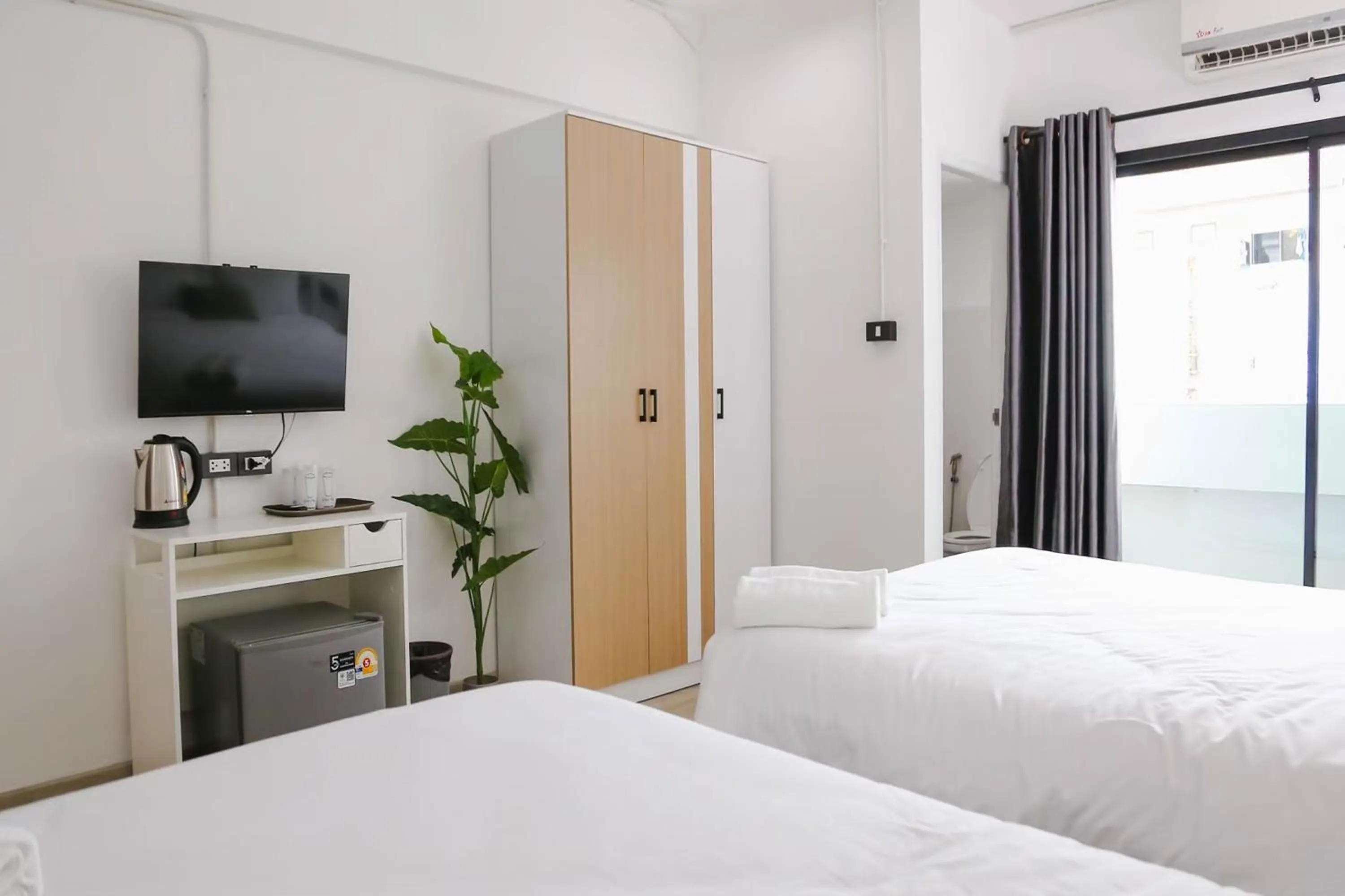 Bed in Chana Bangkok Hotel