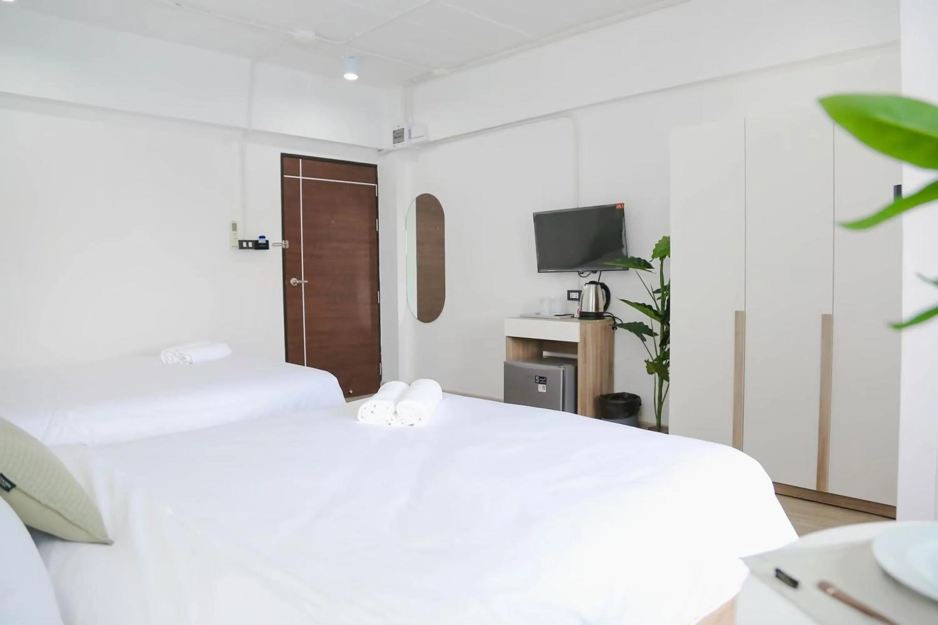 Bed in Chana Bangkok Hotel