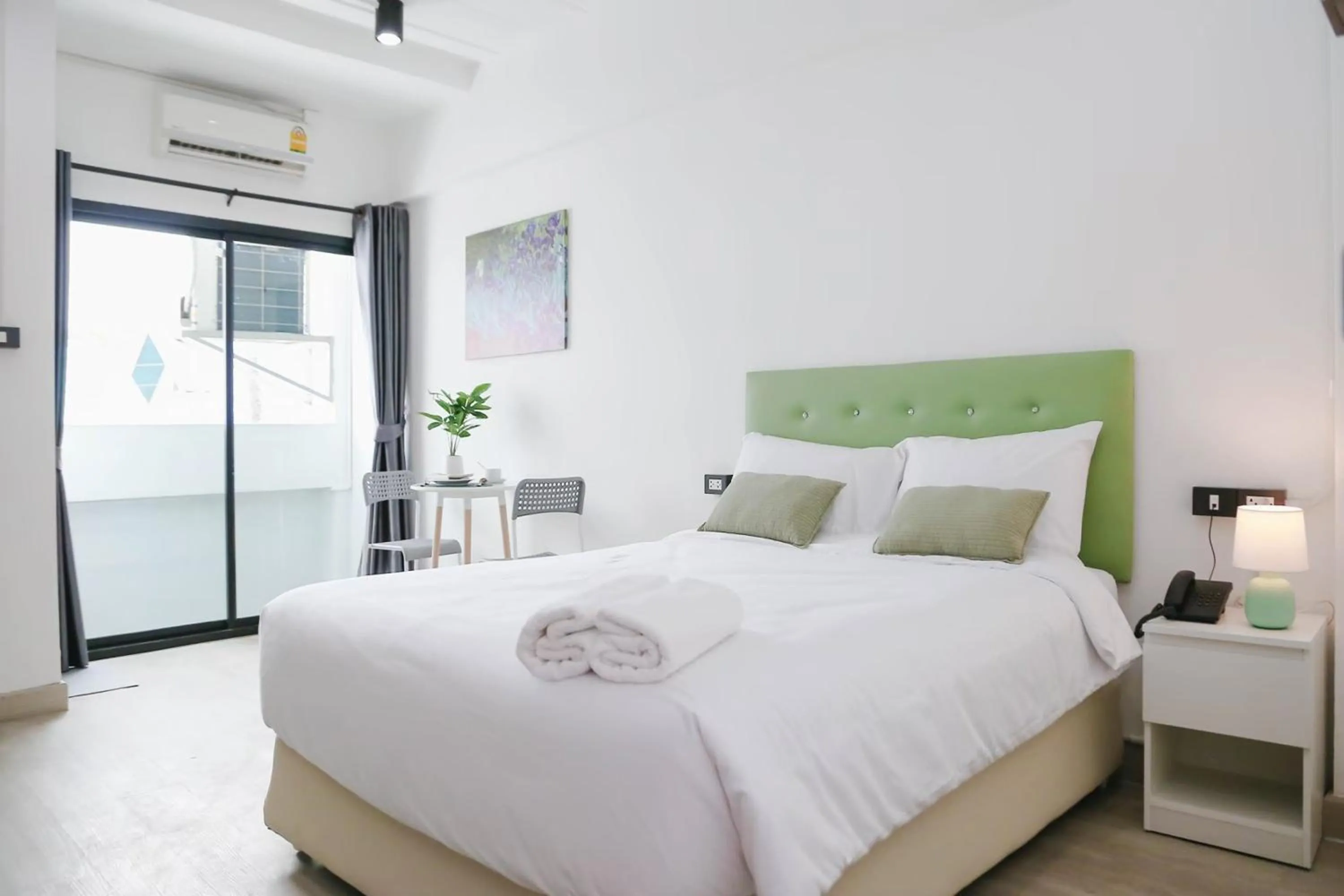 Bed in Chana Bangkok Hotel