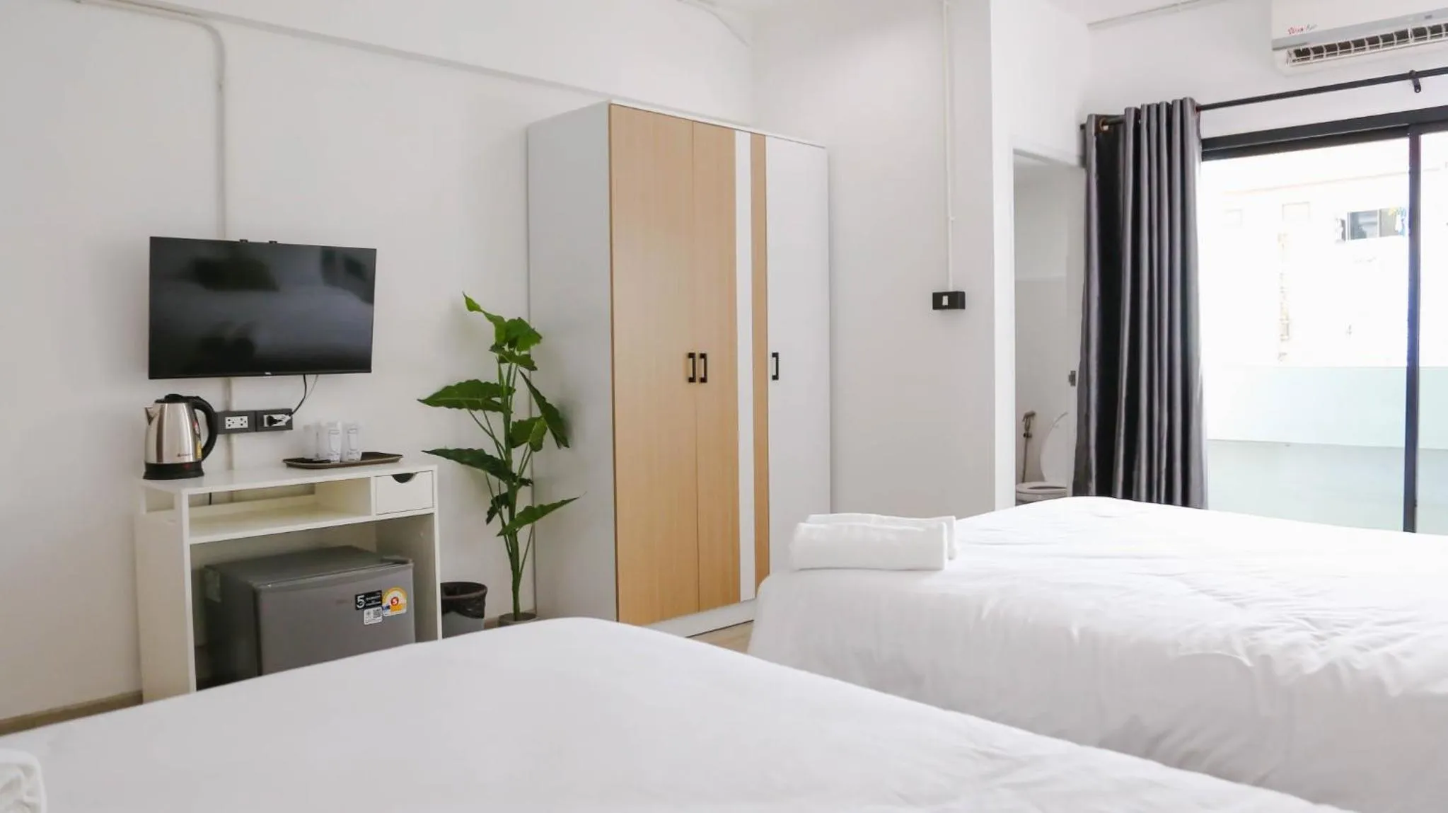 Bed in Chana Bangkok Hotel