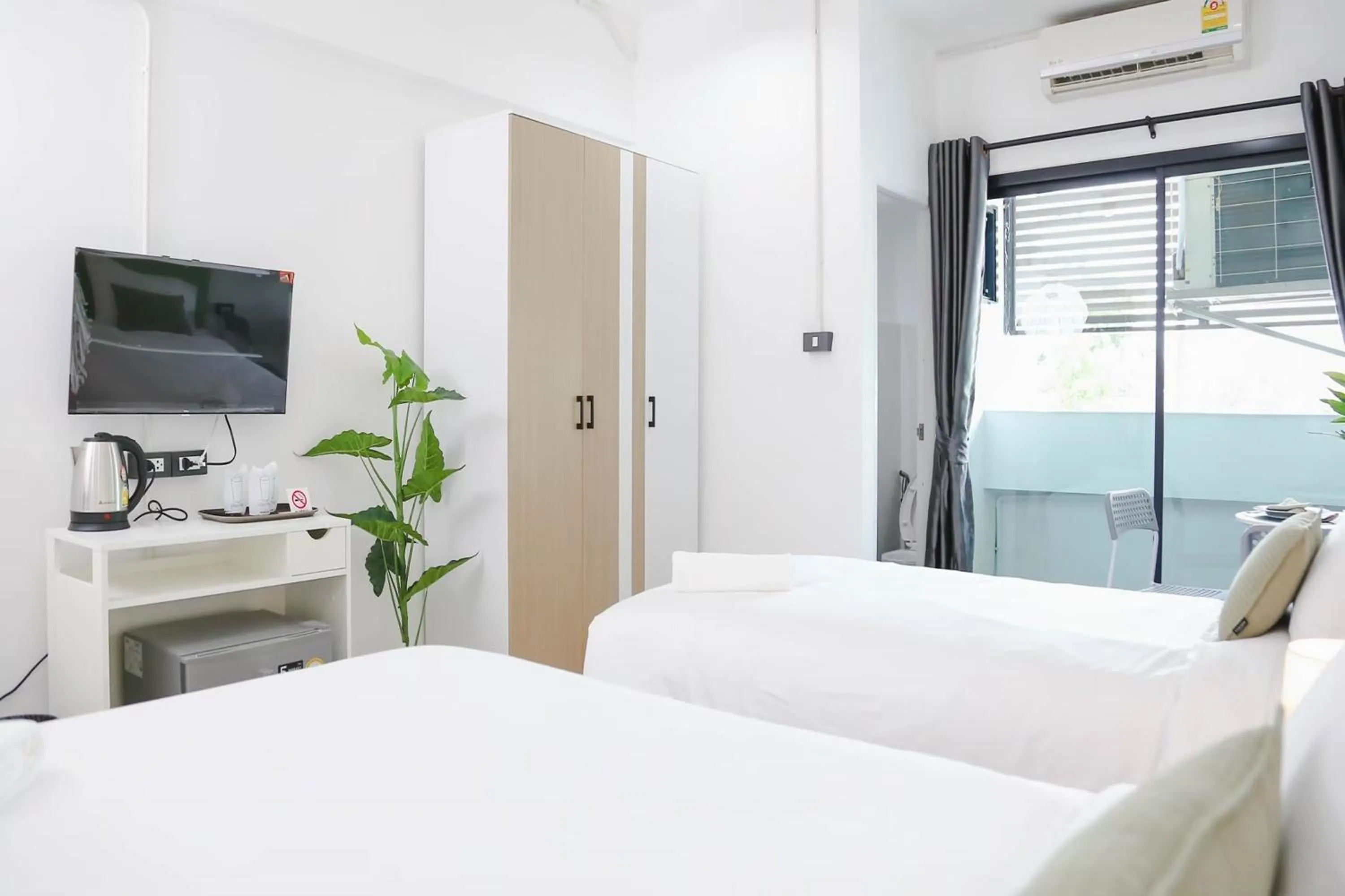 Bed in Chana Bangkok Hotel