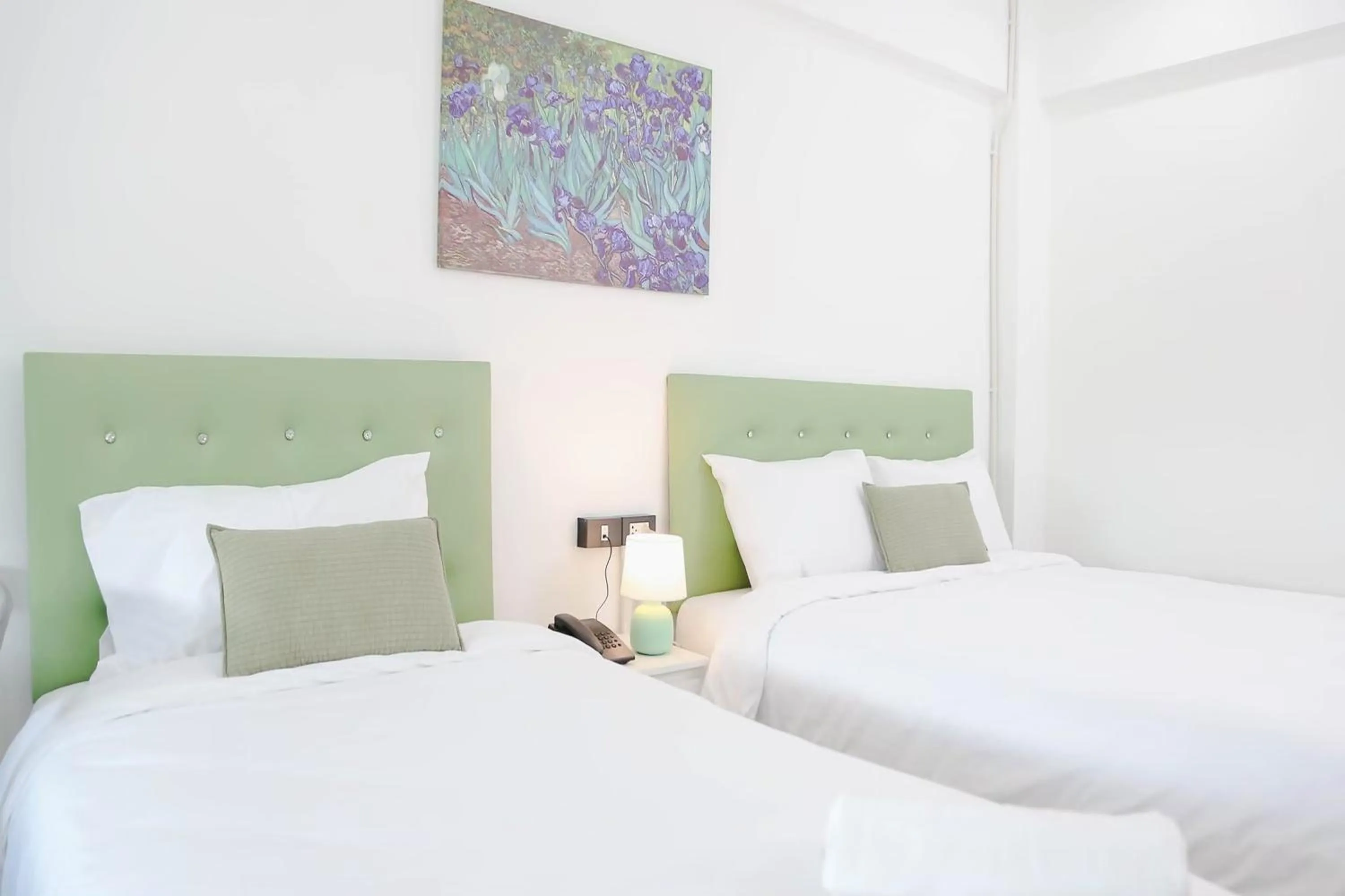 Bed in Chana Bangkok Hotel