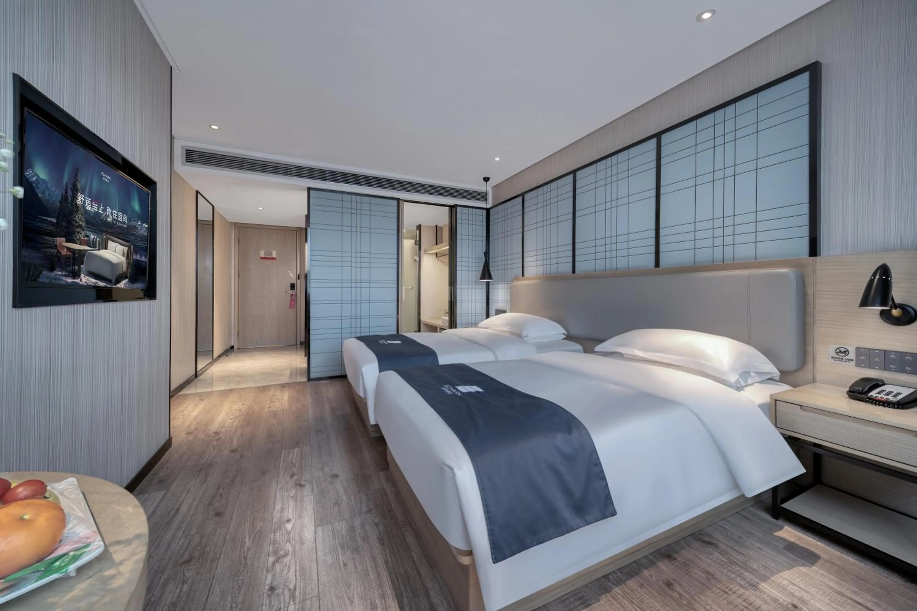 Bed in Echarm International Hotel Pazhou Convention and Exhibition Center Nanzhou Metro Station Branch - Free Shuttle Bus to Canton Fair Complex During Canton Fair Period