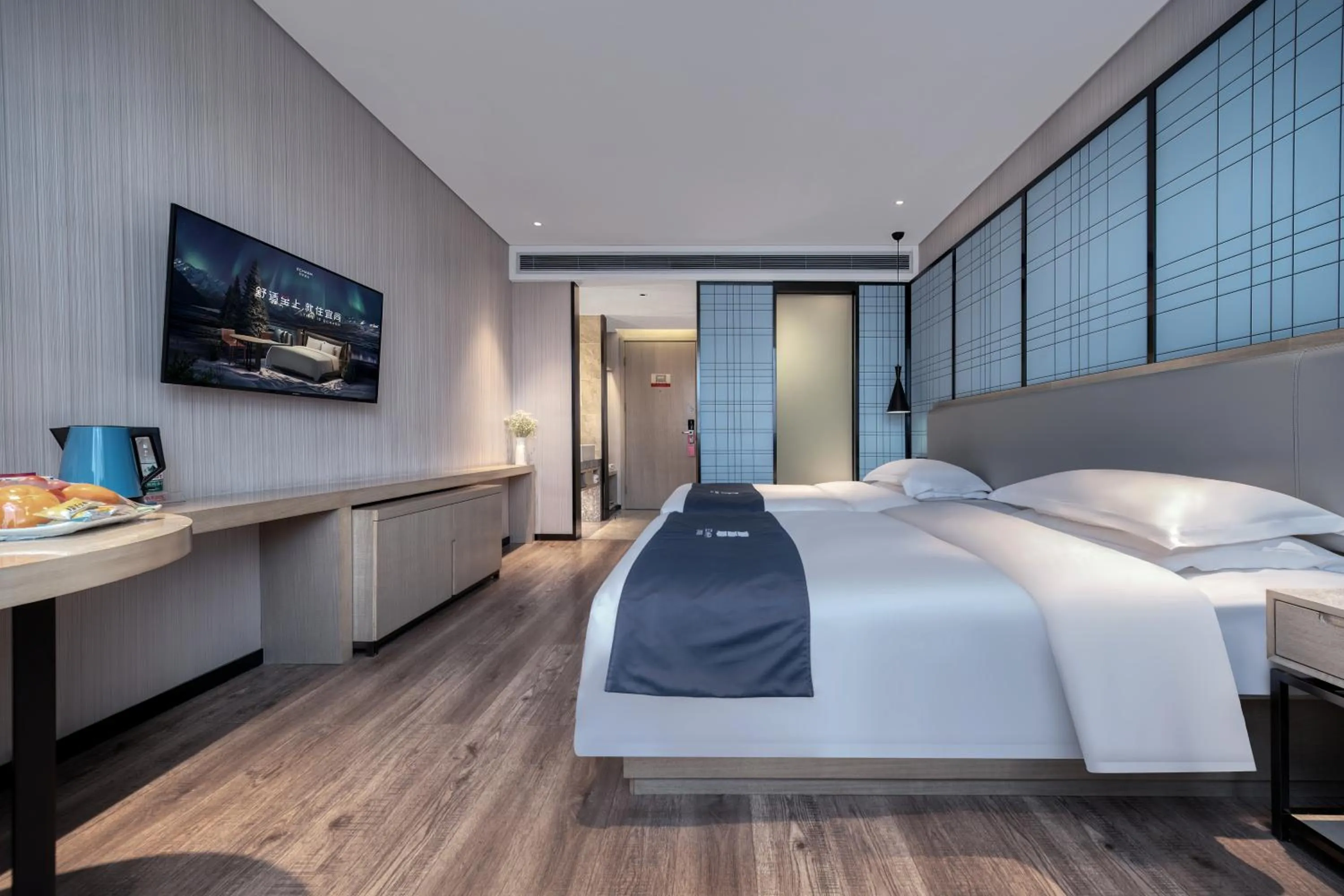Bed in Echarm International Hotel Pazhou Convention and Exhibition Center Nanzhou Metro Station Branch - Free Shuttle Bus to Canton Fair Complex During Canton Fair Period