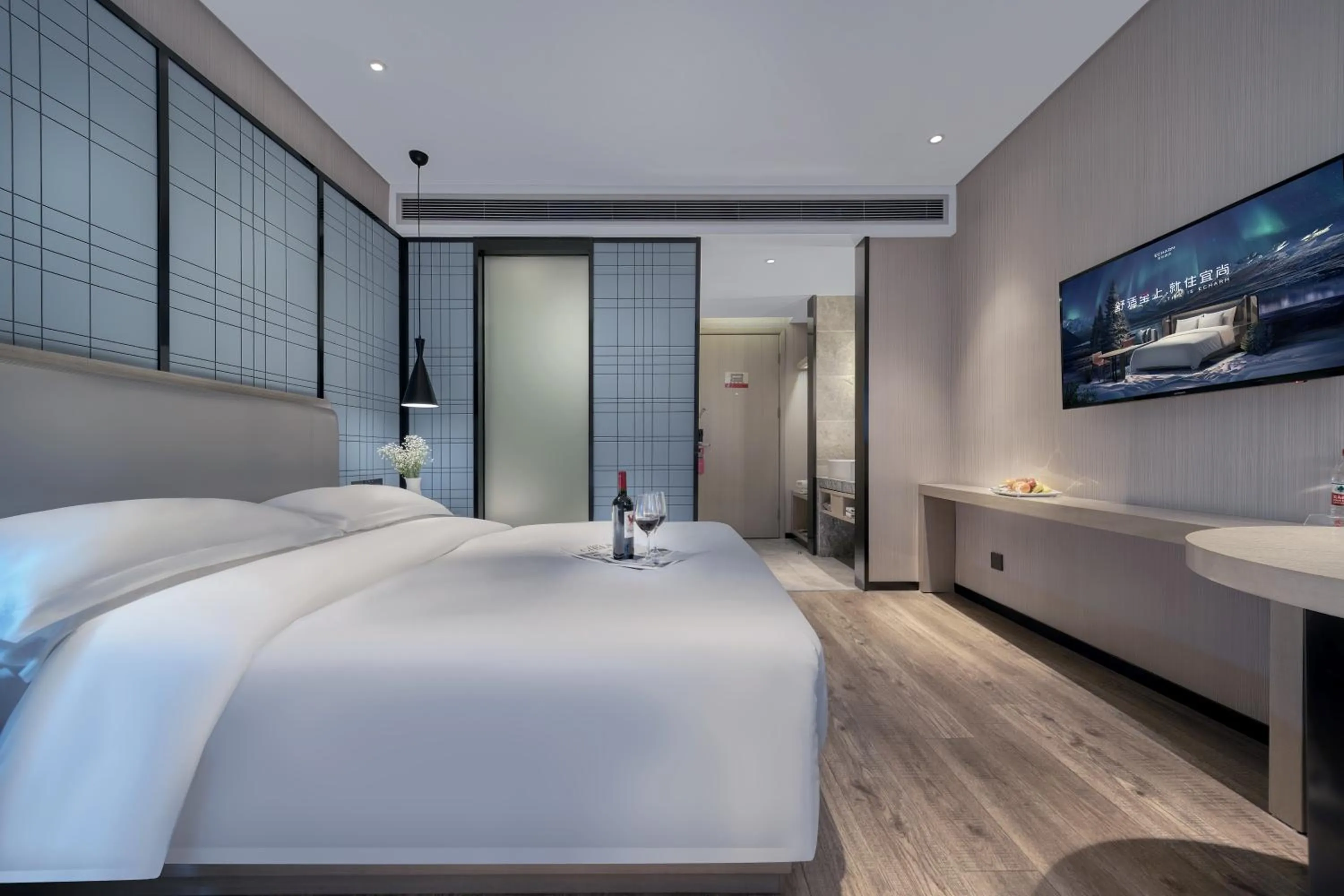 Bed in Echarm International Hotel Pazhou Convention and Exhibition Center Nanzhou Metro Station Branch - Free Shuttle Bus to Canton Fair Complex During Canton Fair Period