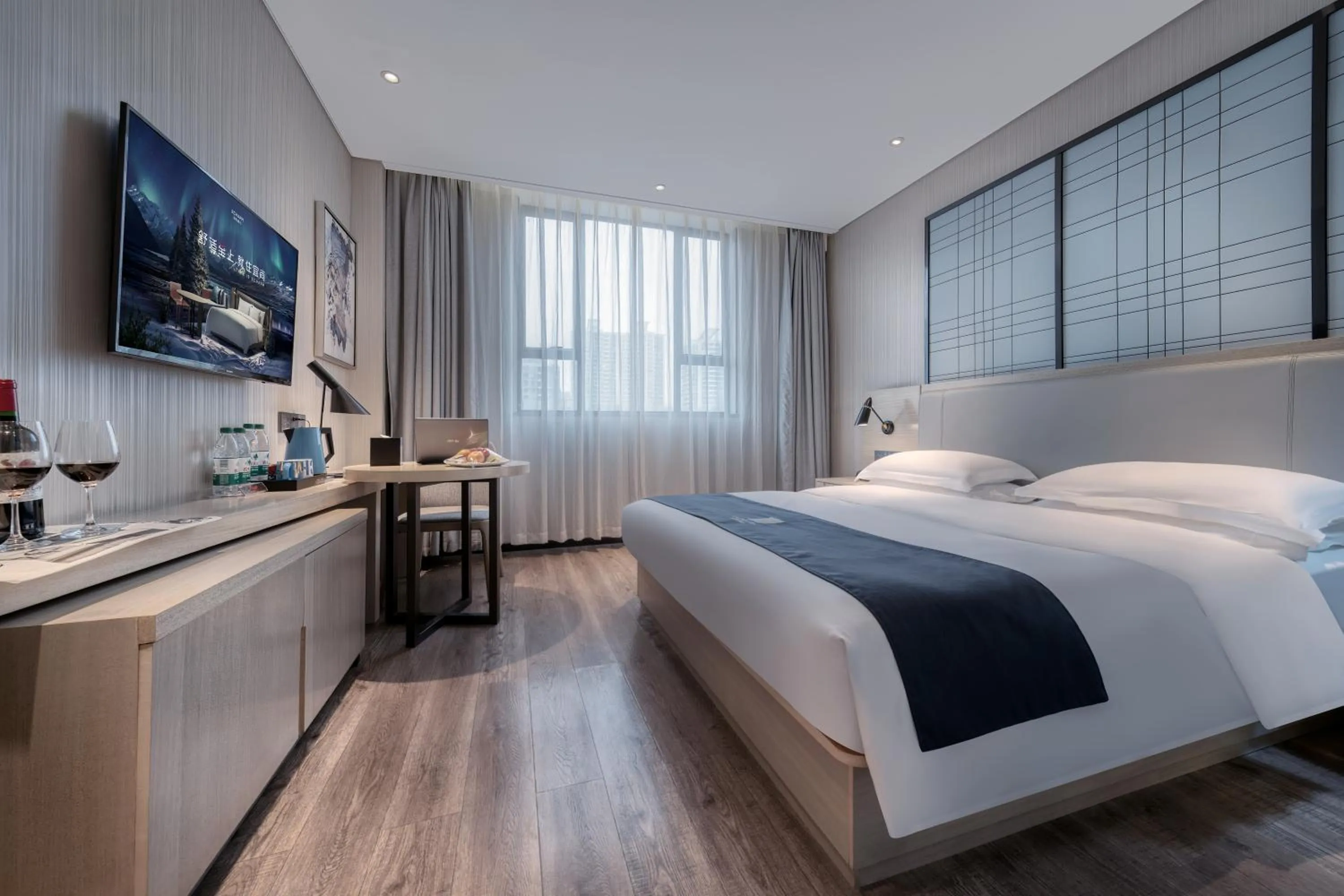 Bed in Echarm International Hotel Pazhou Convention and Exhibition Center Nanzhou Metro Station Branch - Free Shuttle Bus to Canton Fair Complex During Canton Fair Period