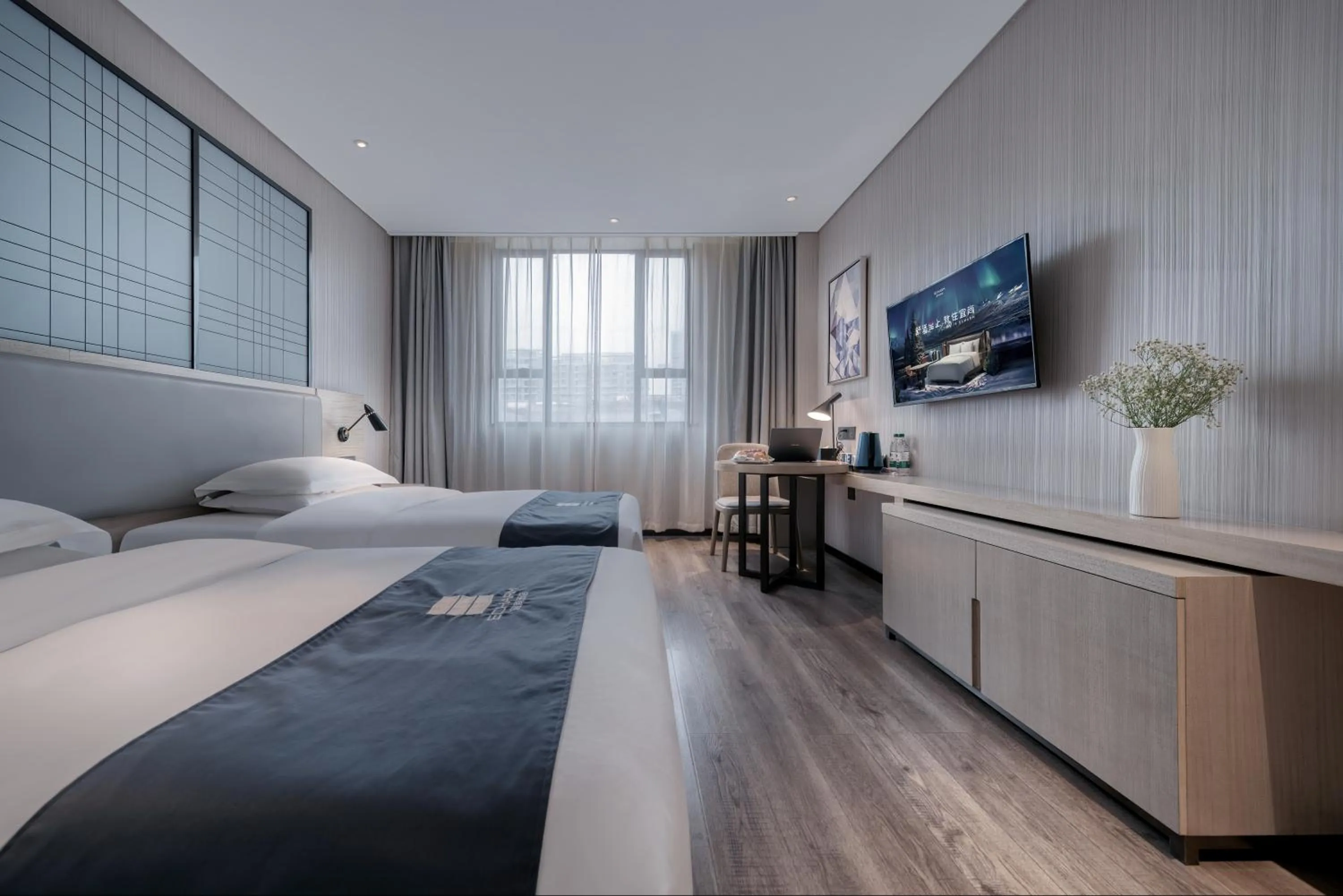 Bed in Echarm International Hotel Pazhou Convention and Exhibition Center Nanzhou Metro Station Branch - Free Shuttle Bus to Canton Fair Complex During Canton Fair Period