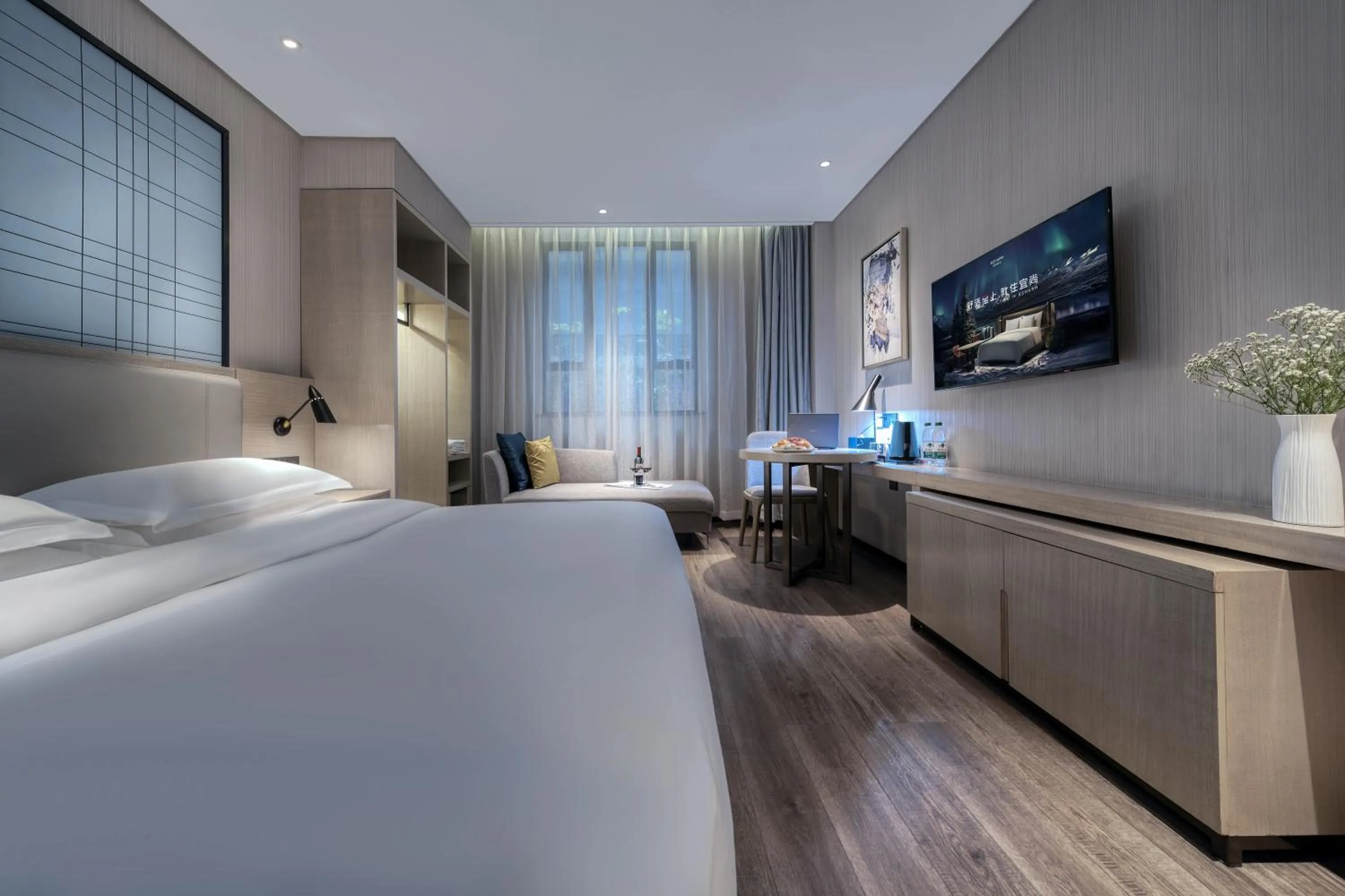 Bed in Echarm International Hotel Pazhou Convention and Exhibition Center Nanzhou Metro Station Branch - Free Shuttle Bus to Canton Fair Complex During Canton Fair Period