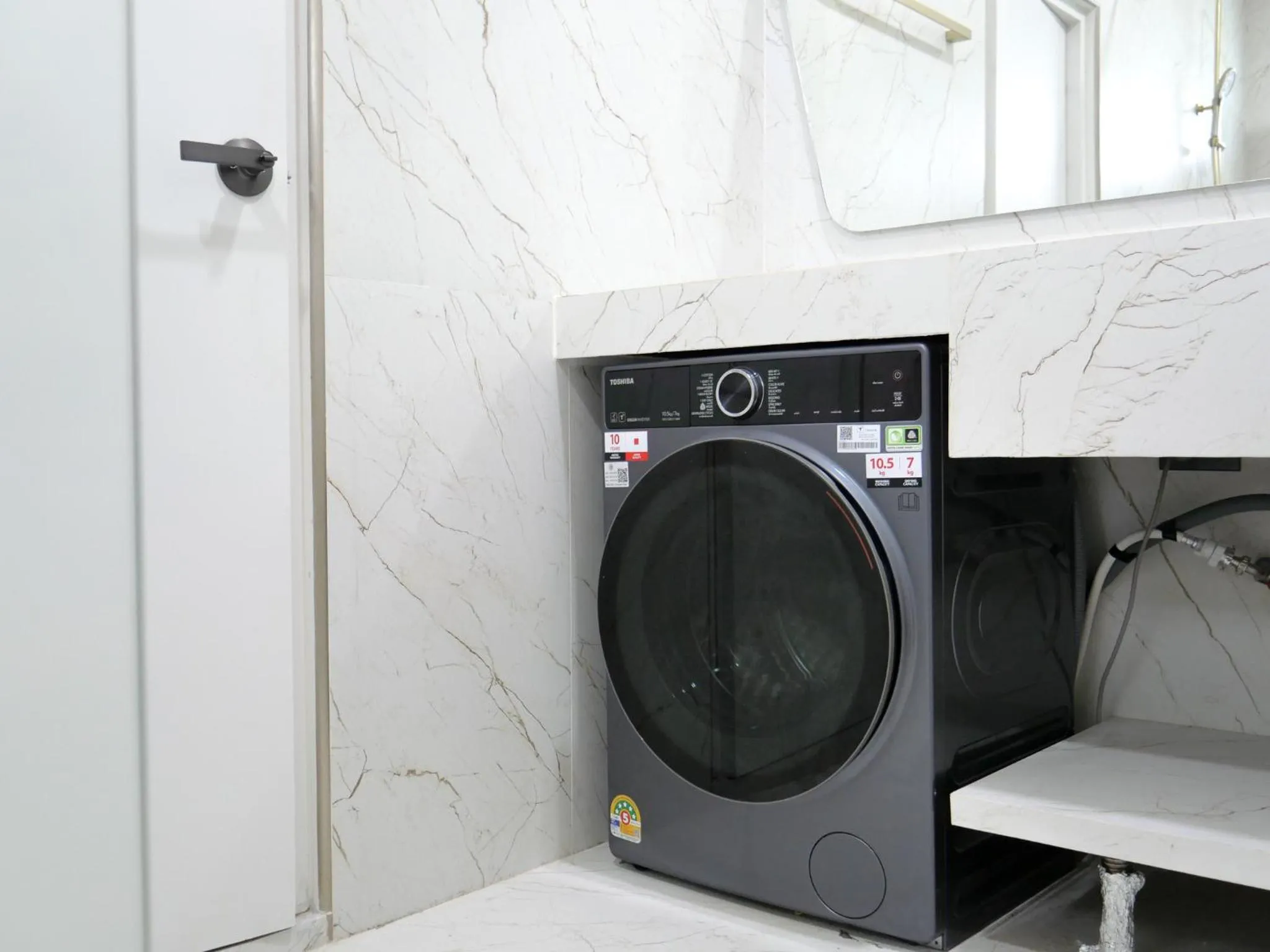 washing machine in Beachside Residence