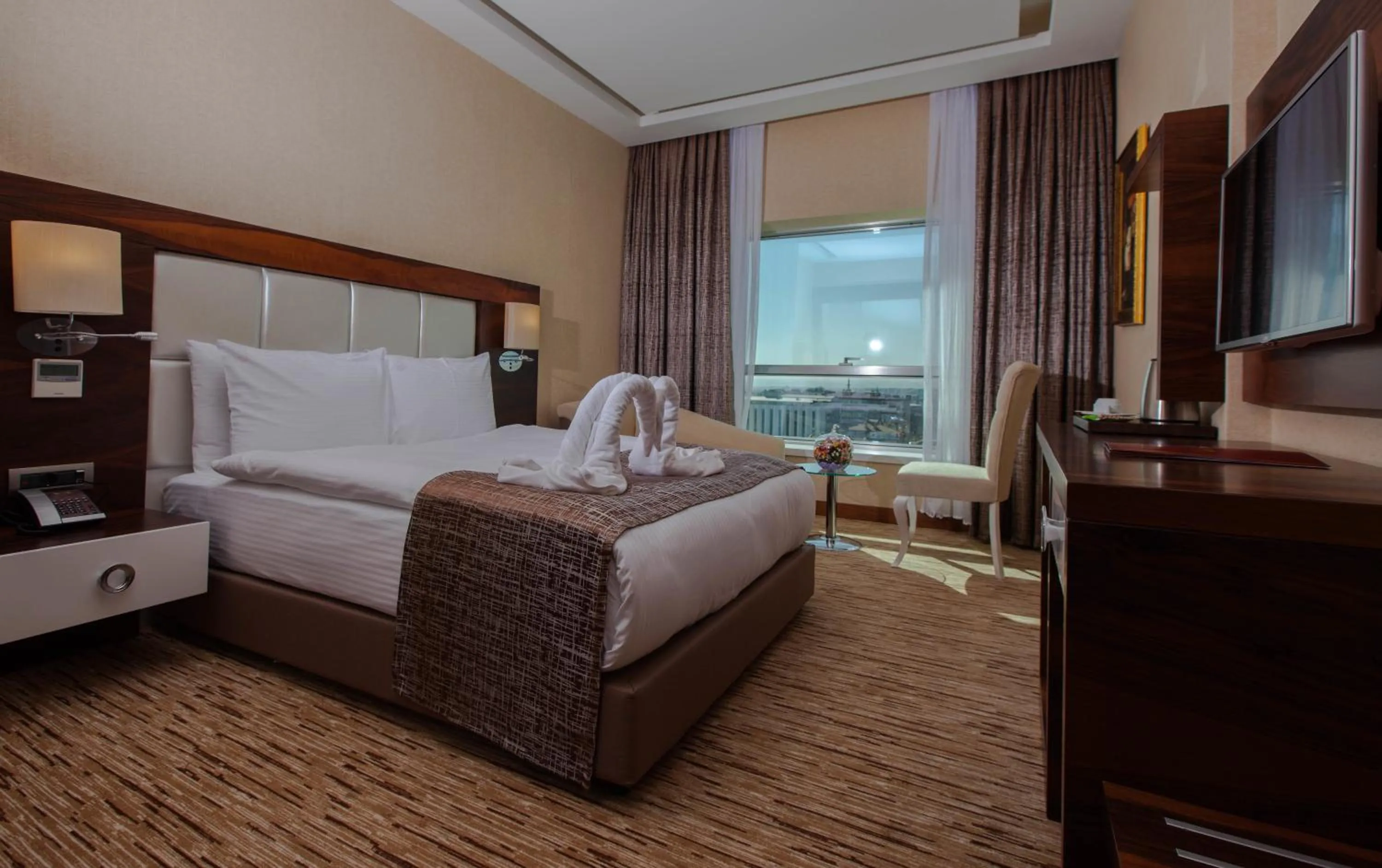 Photo of the whole room, Bed in Mitannia Regency Hotel