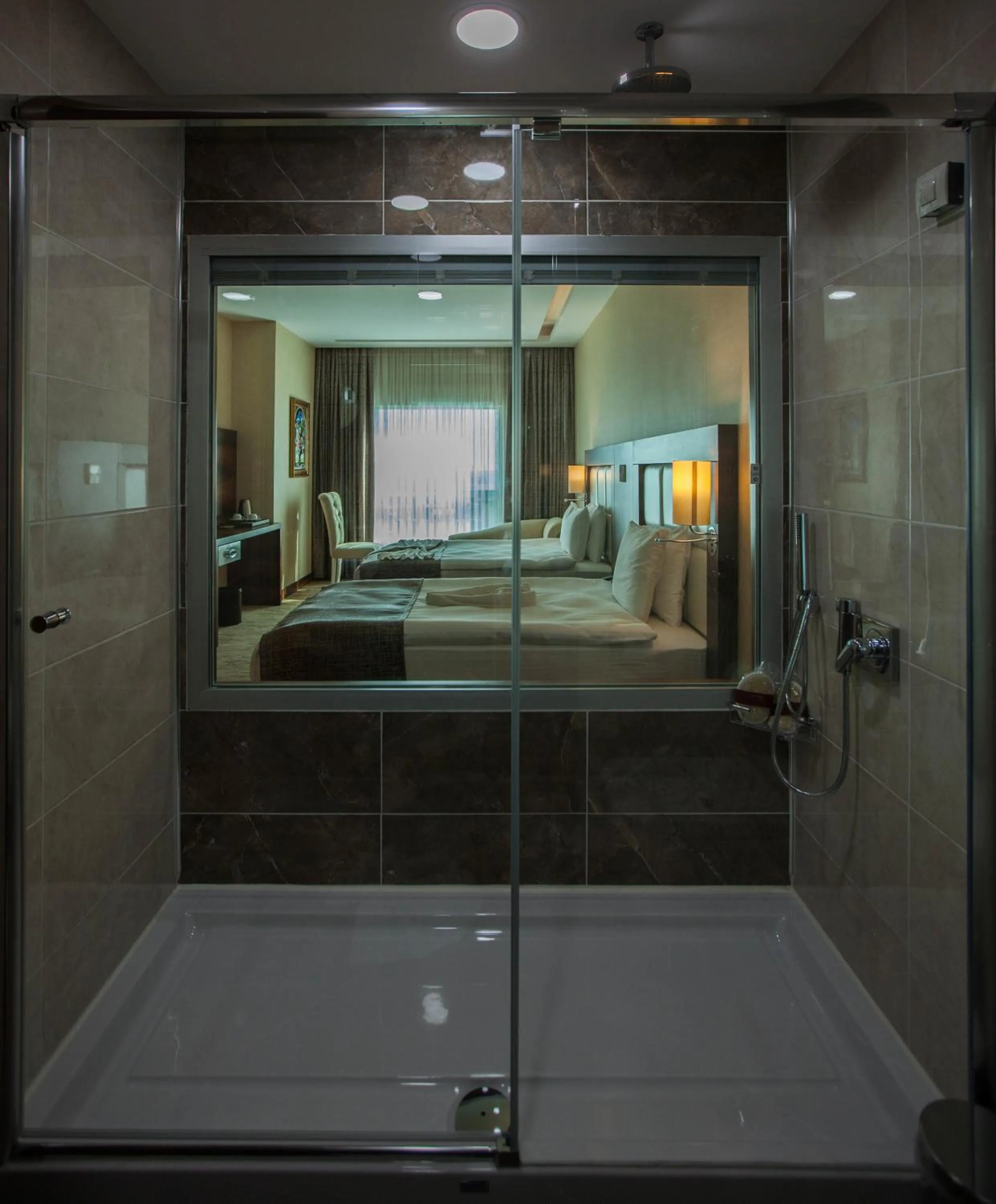 Bathroom in Mitannia Regency Hotel