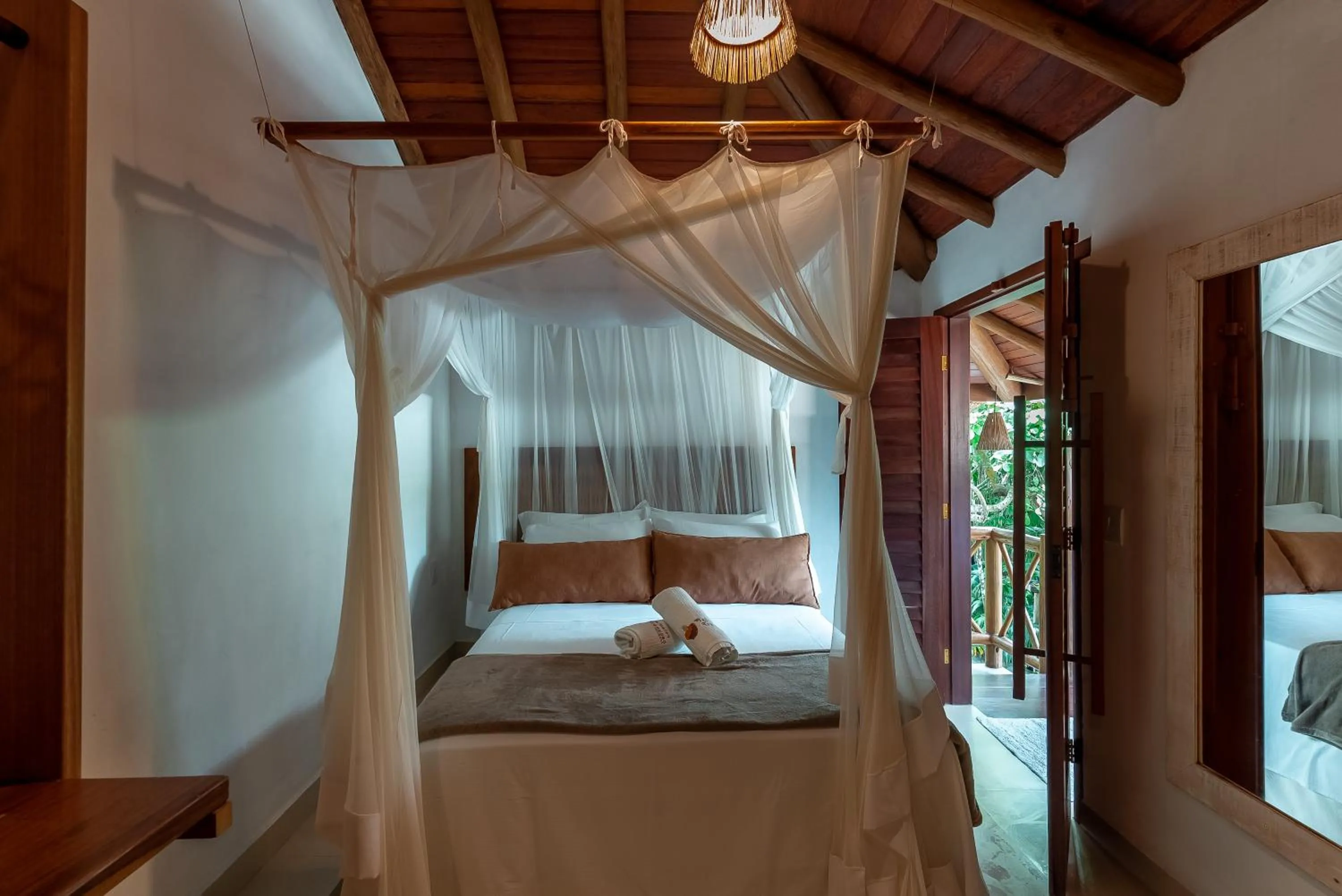 Bed in Pousada Cajueiro Trancoso