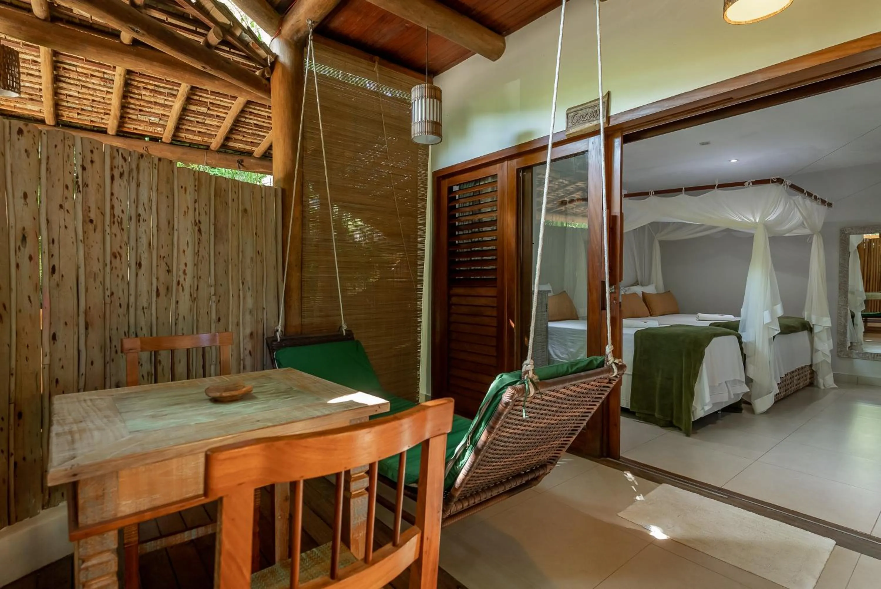 Photo of the whole room, Bed in Pousada Cajueiro Trancoso