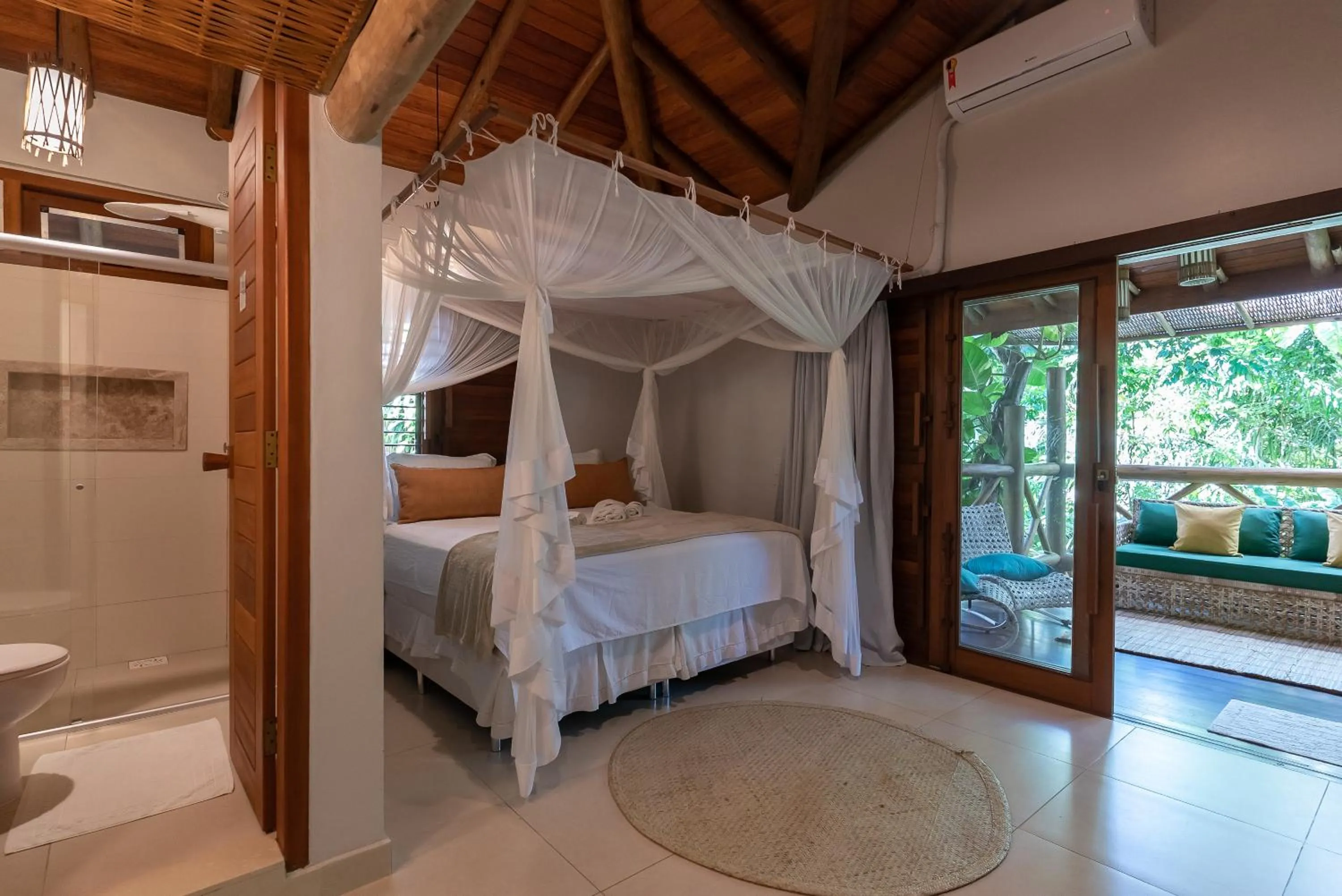 Bed in Pousada Cajueiro Trancoso